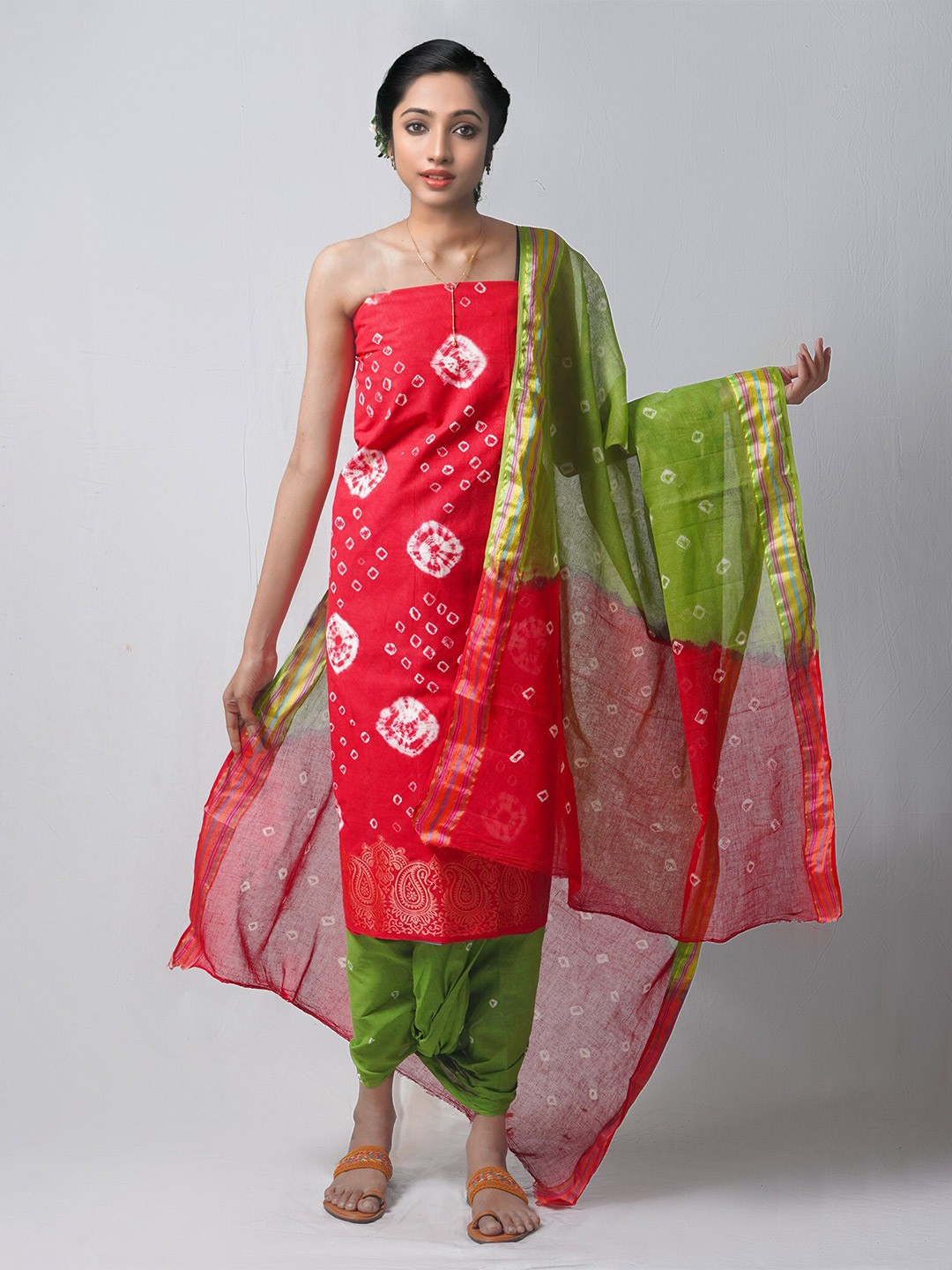 

Unnati Silks Red & White Dyed Pure Cotton Unstitched Dress Material