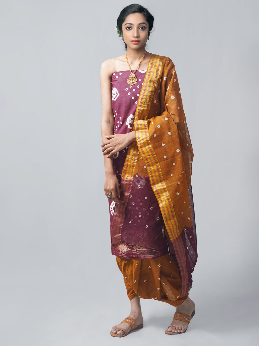 

Unnati Silks Purple & Brown Dyed Pure Cotton Unstitched Dress Material
