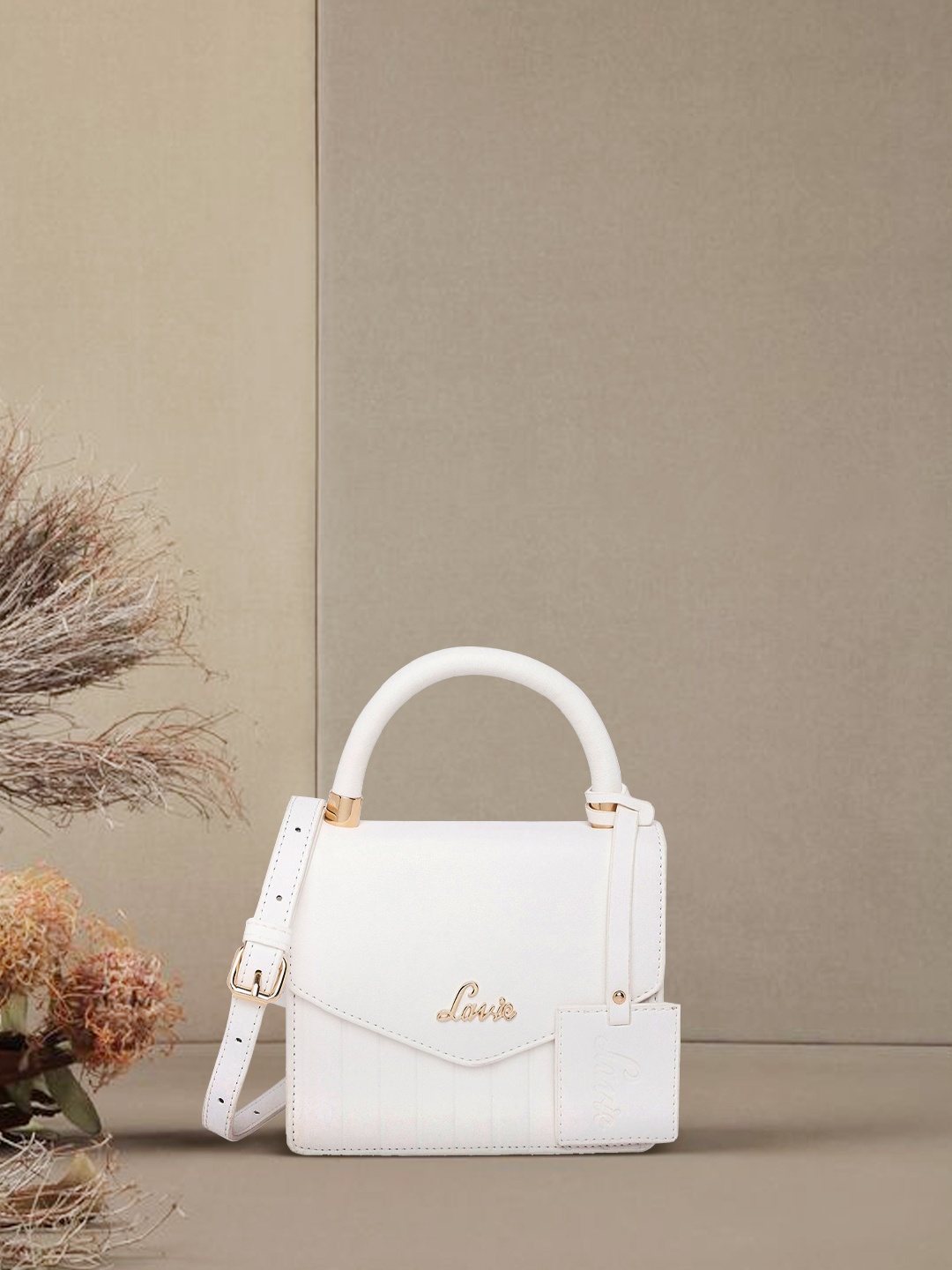 

Lavie Aura Women White Flap Satchel