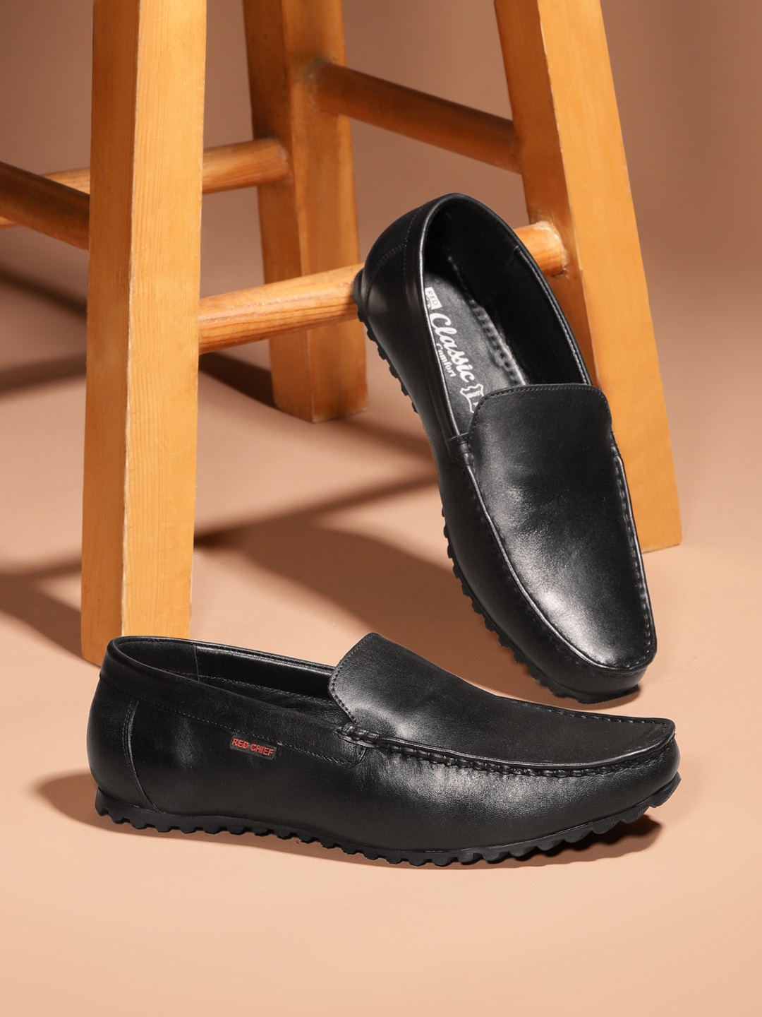 

Red Chief Men Black Solid Leather Formal Loafers