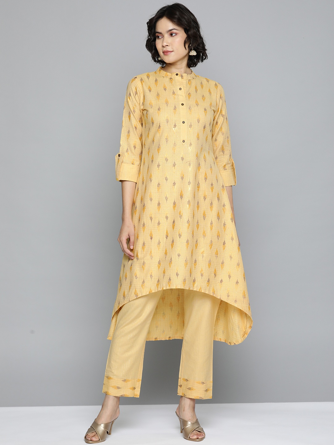 

Kvsfab Women Mustard Yellow Ethnic Motifs Pleated Kurta with Trousers