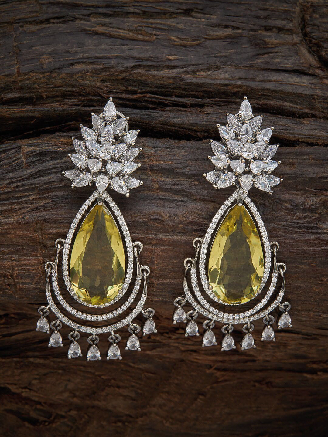 

Kushal's Fashion Jewellery Yellow Teardrop Shaped Studs Earrings