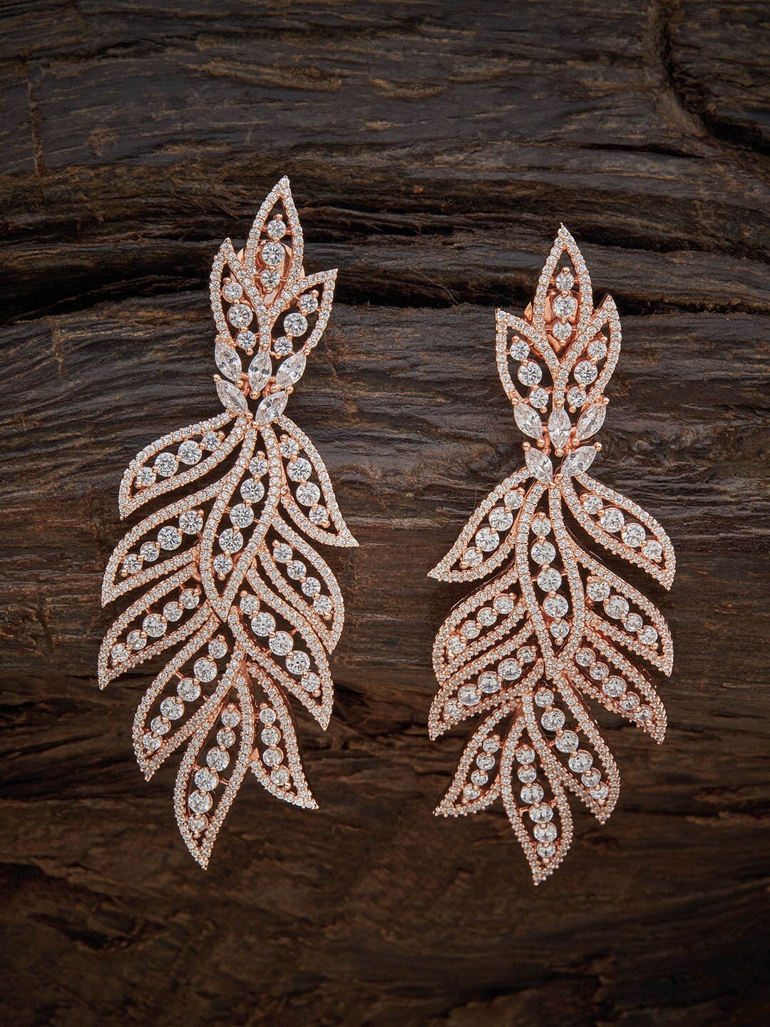 

Kushal's Fashion Jewellery White Leaf Shaped Studs Earrings