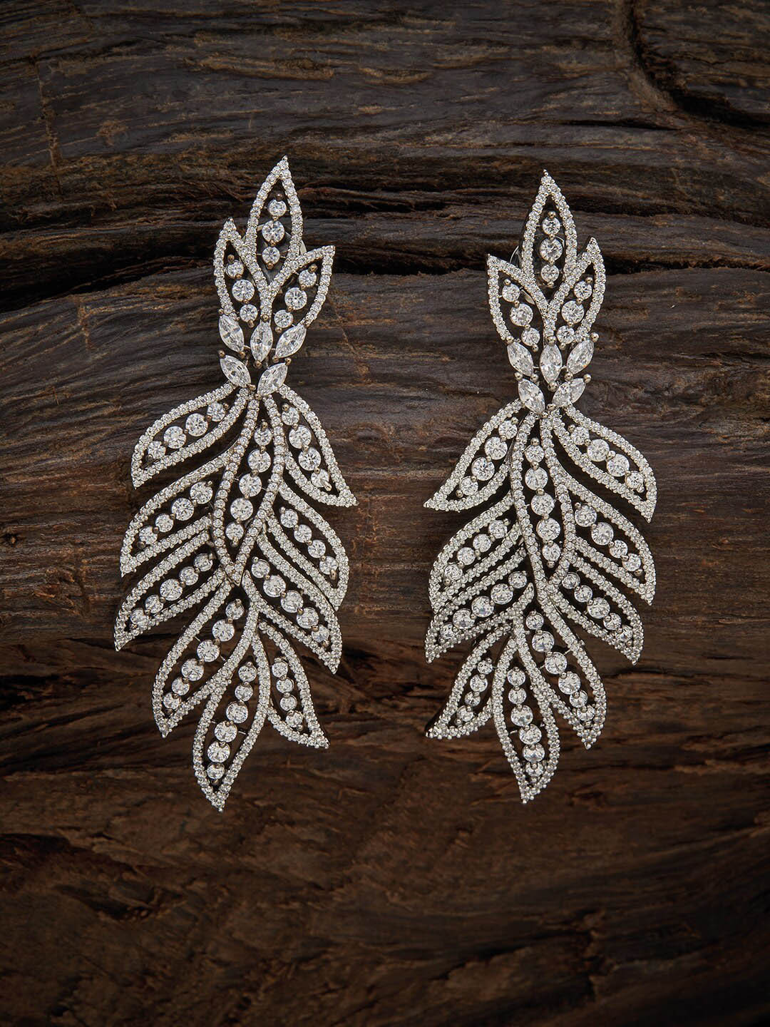 

Kushal's Fashion Jewellery White Leaf Shaped Drop Earrings