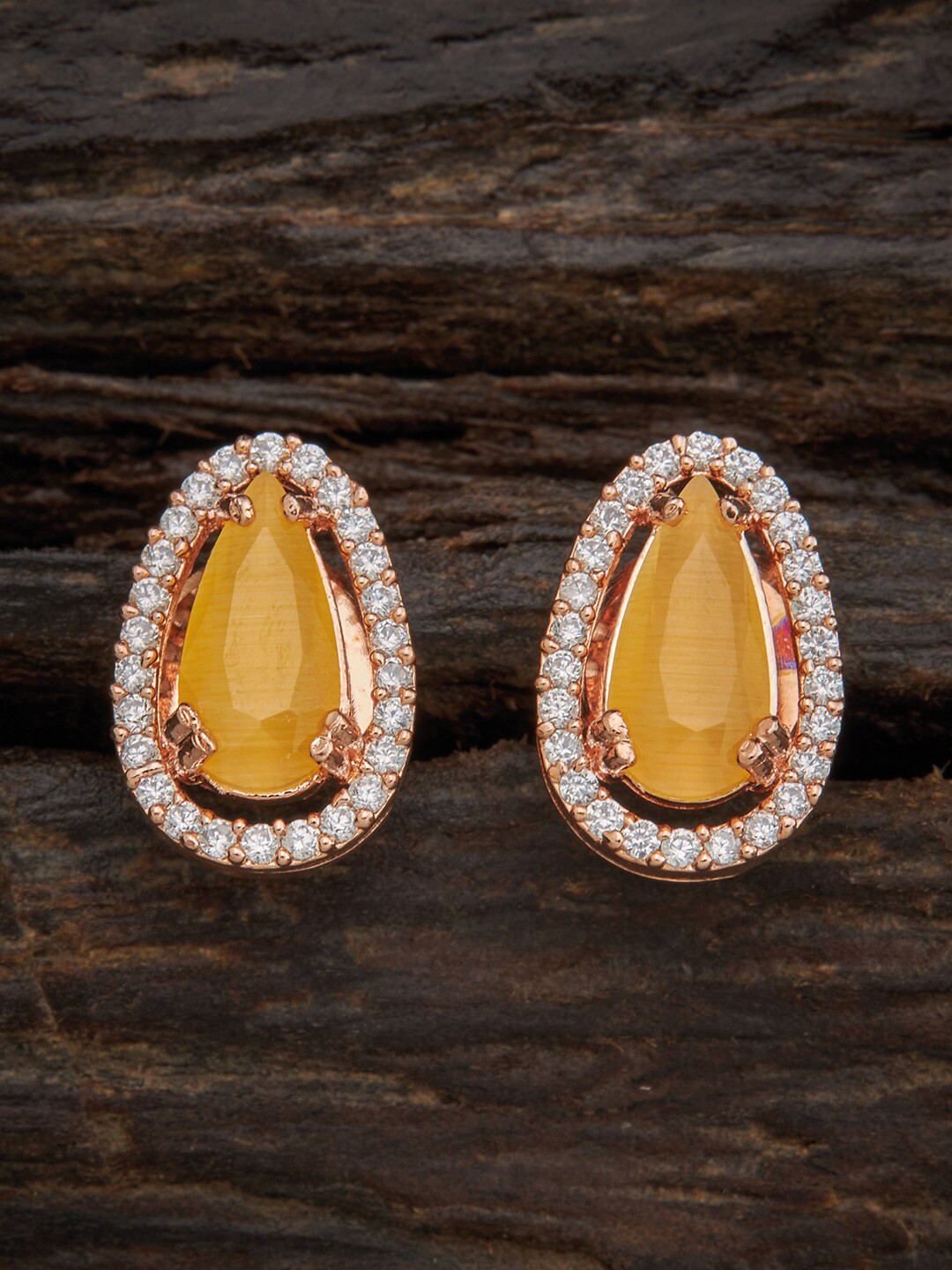 

Kushal's Fashion Jewellery Yellow Oval Studs Earrings