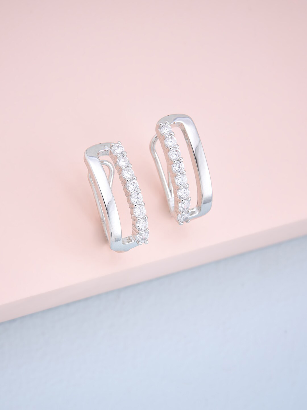 

Kushal's Fashion Jewellery White Contemporary Studs Earrings