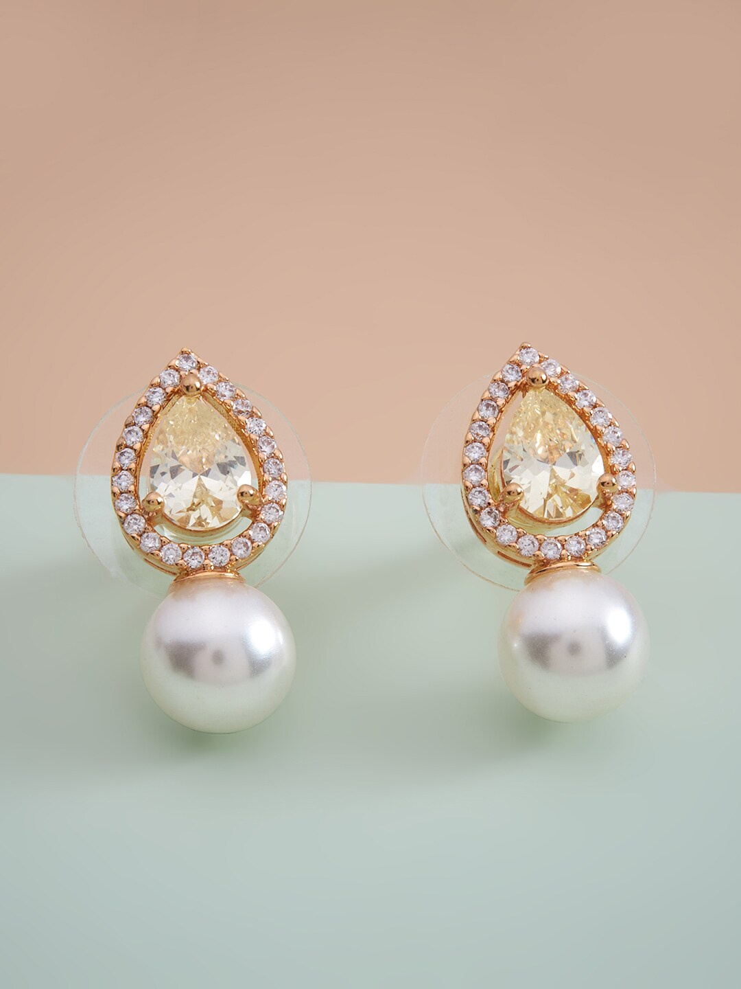 

Kushal's Fashion Jewellery Yellow Teardrop Shaped Studs Earrings