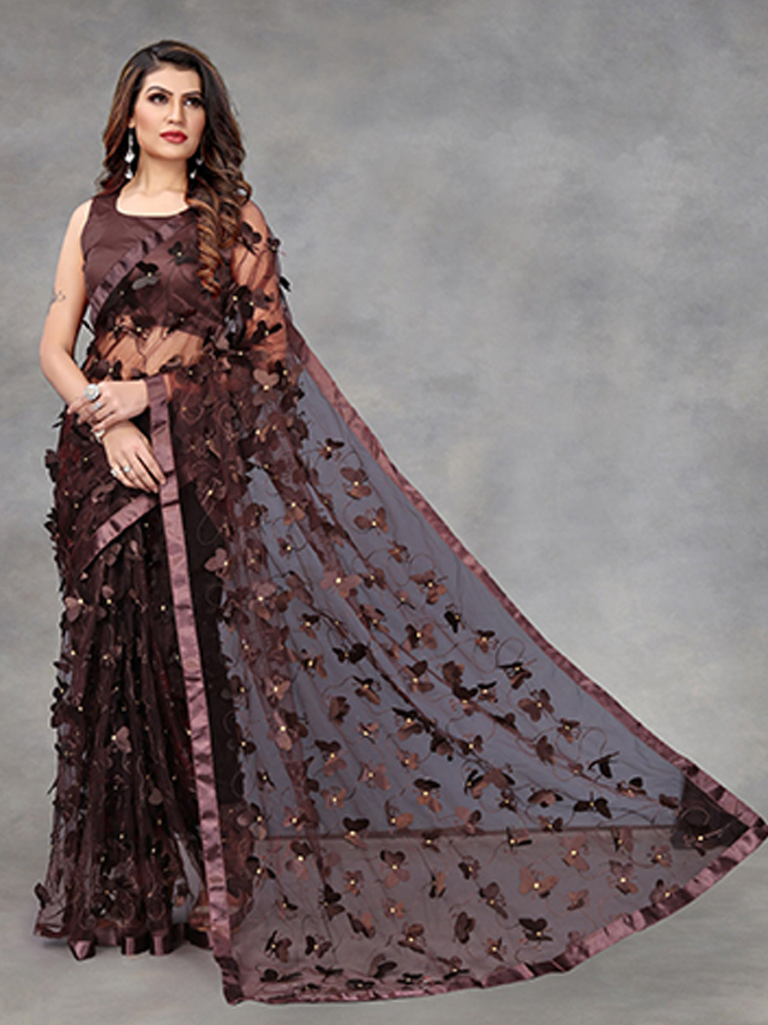 

APNISHA Brown Floral Embroidered Net Saree