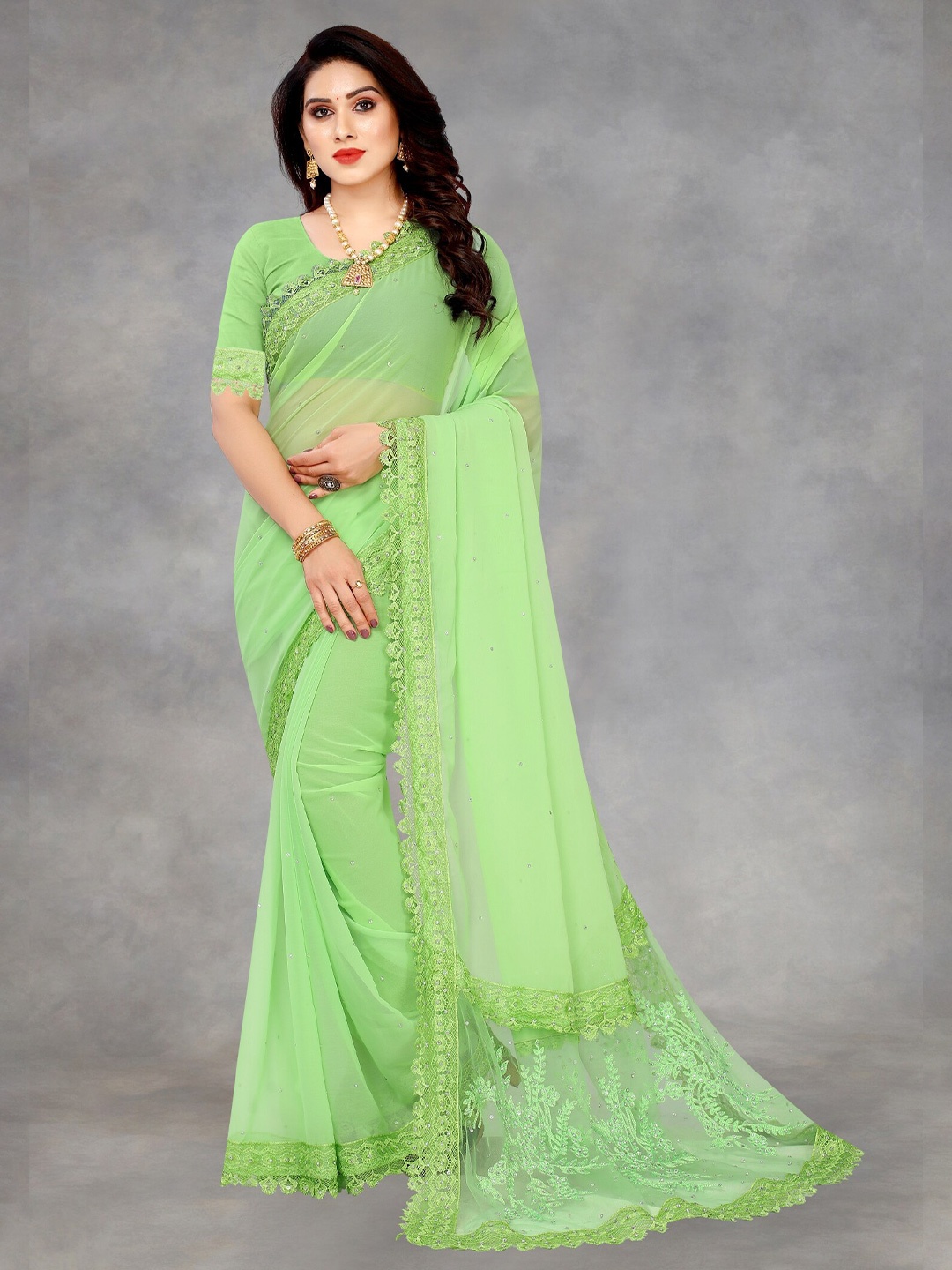 

APNISHA Green Floral Embroidered Pure Georgette Saree