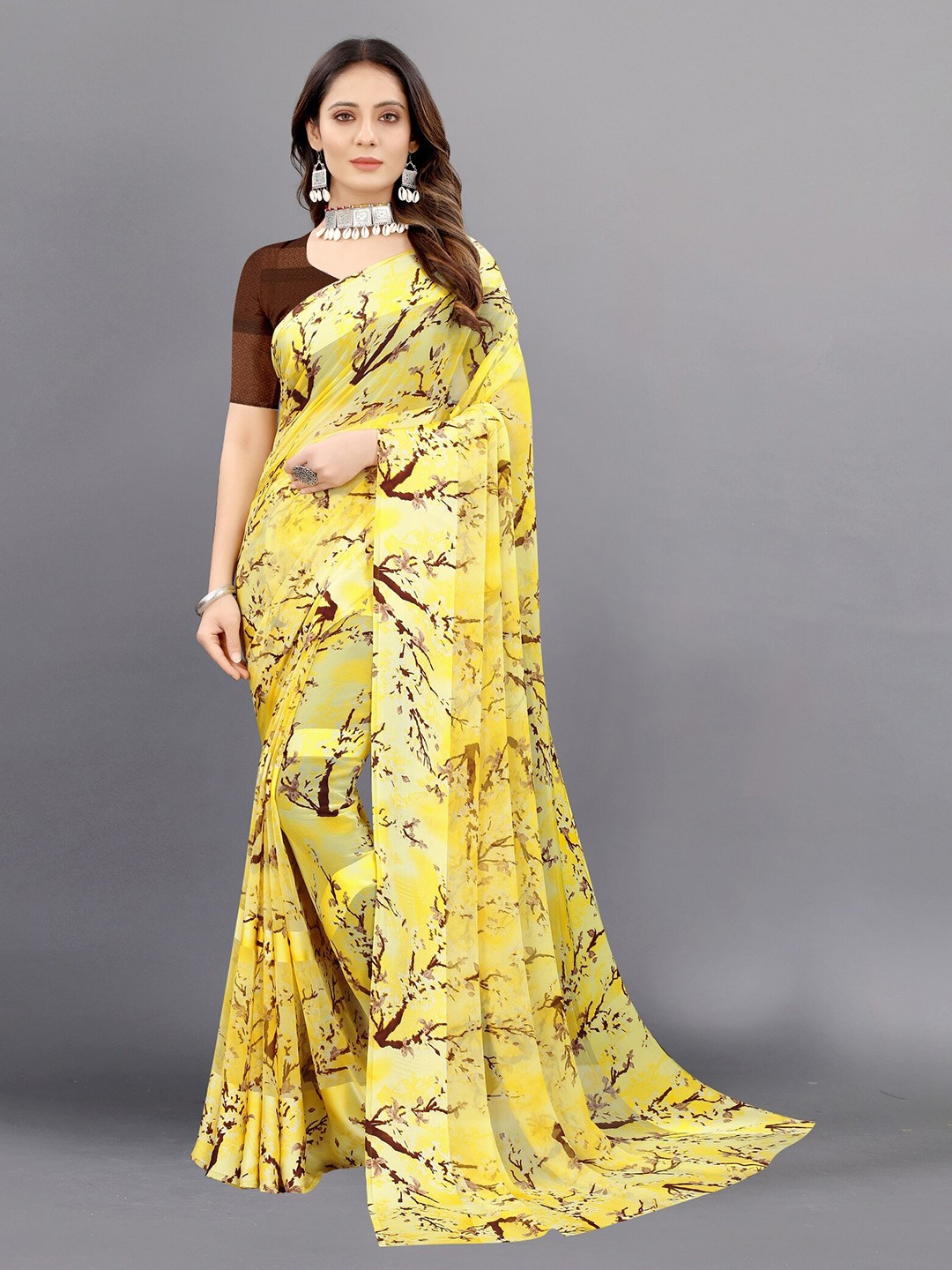 

APNISHA Yellow & Brown Floral Pure Georgette Saree