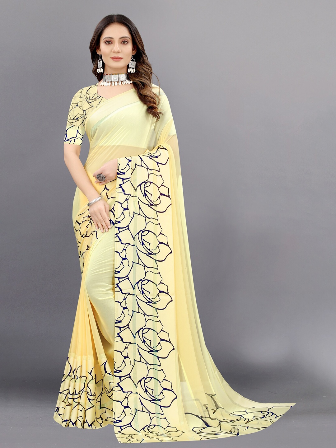 

APNISHA Yellow & Black Floral Zari Pure Georgette Saree