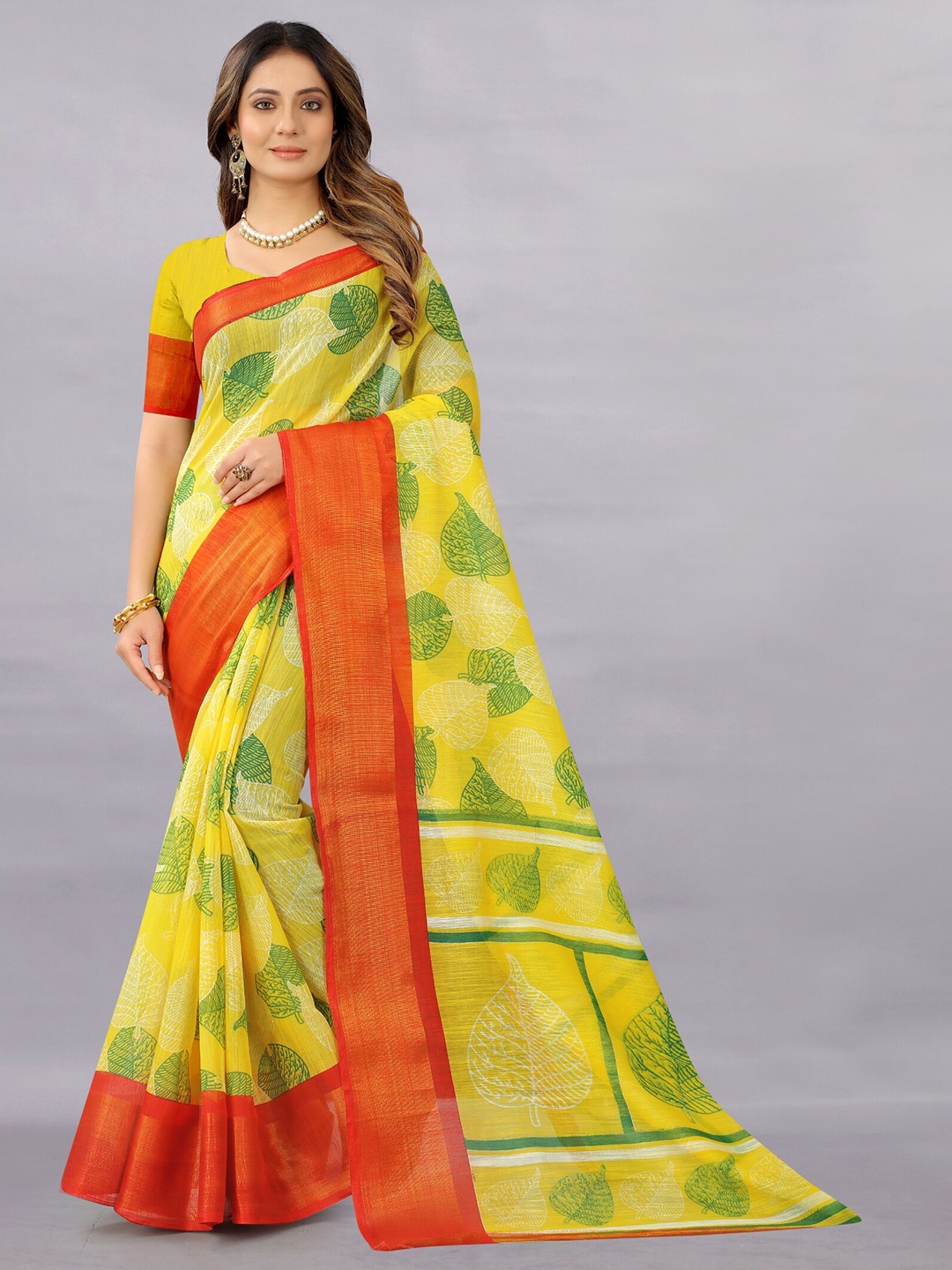 

APNISHA Yellow & Red Floral Zari Pure Cotton Saree