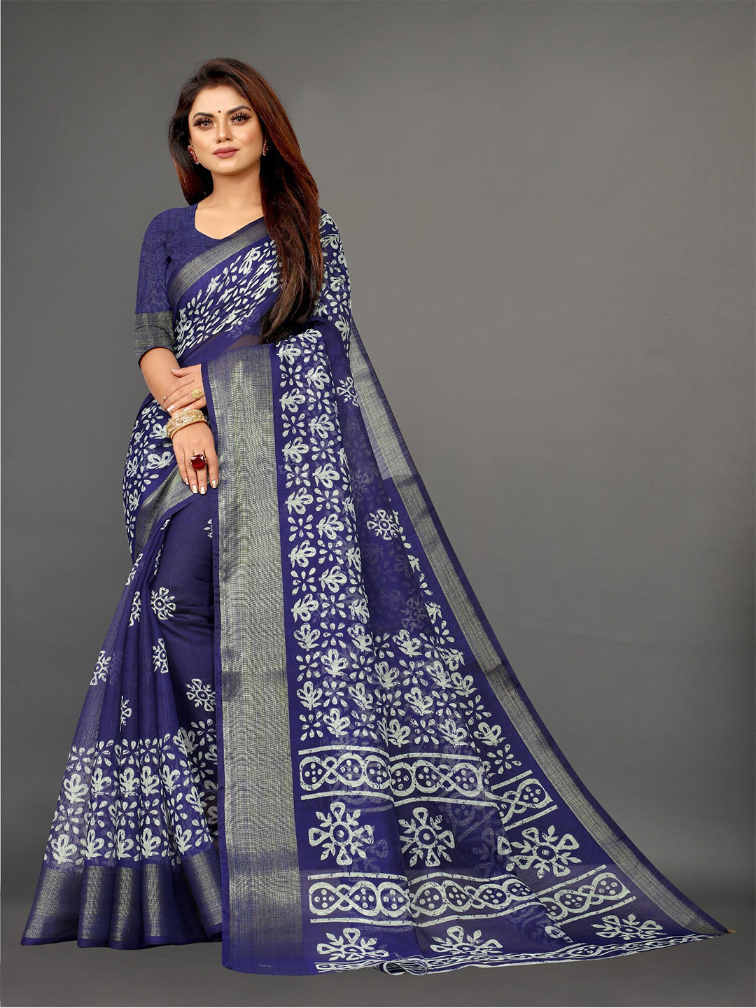 

APNISHA Blue & White Ethnic Motifs Zari Pure Cotton Saree