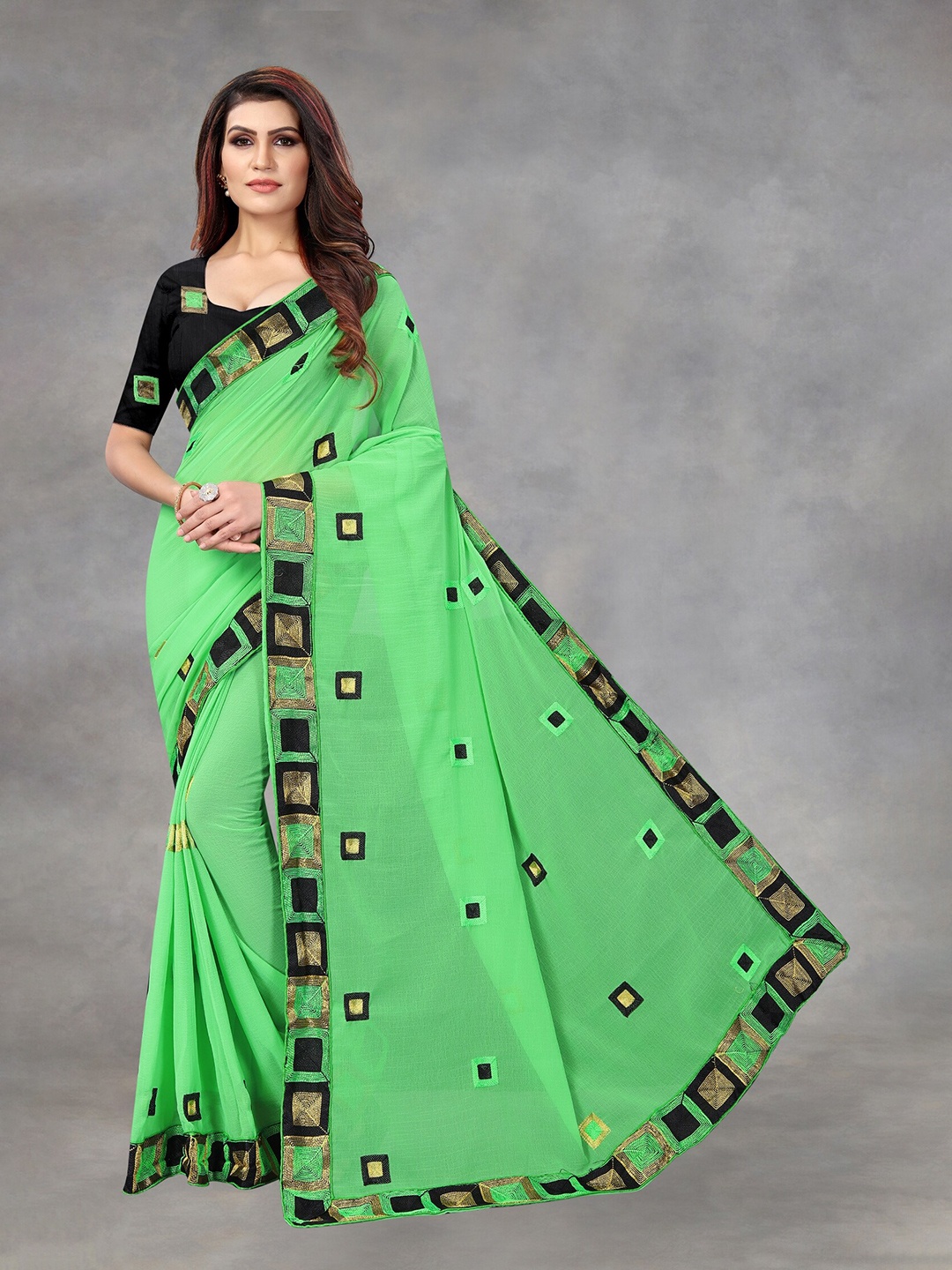 

APNISHA Green & Black Embroidered Pure Chiffon Saree