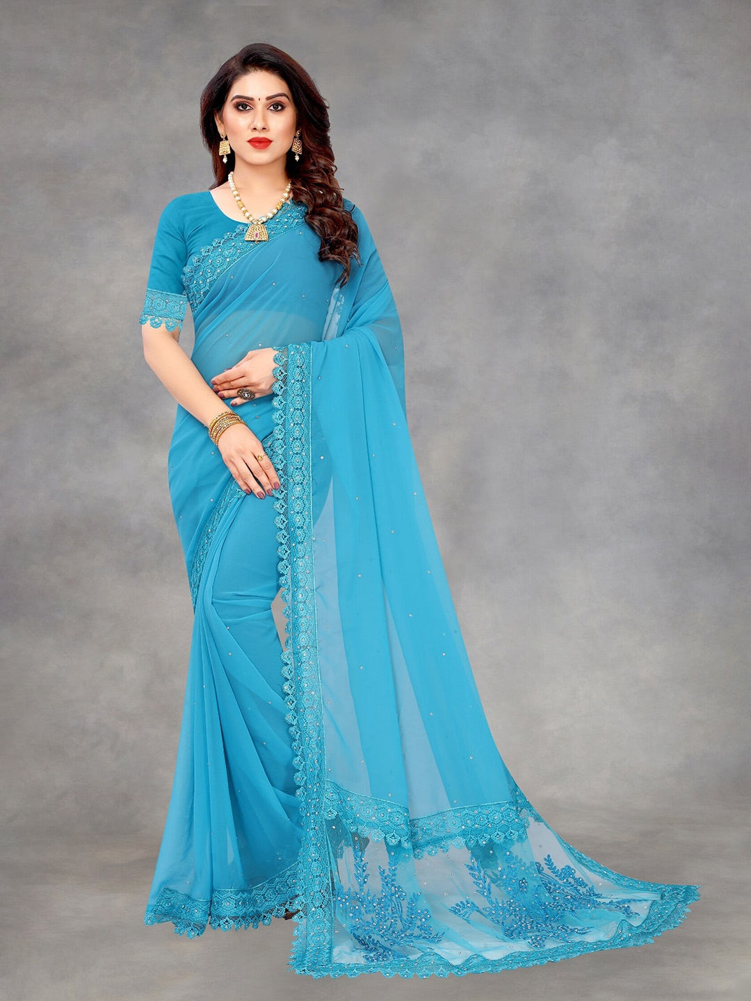 

APNISHA Blue Floral Embroidered Pure Georgette Saree