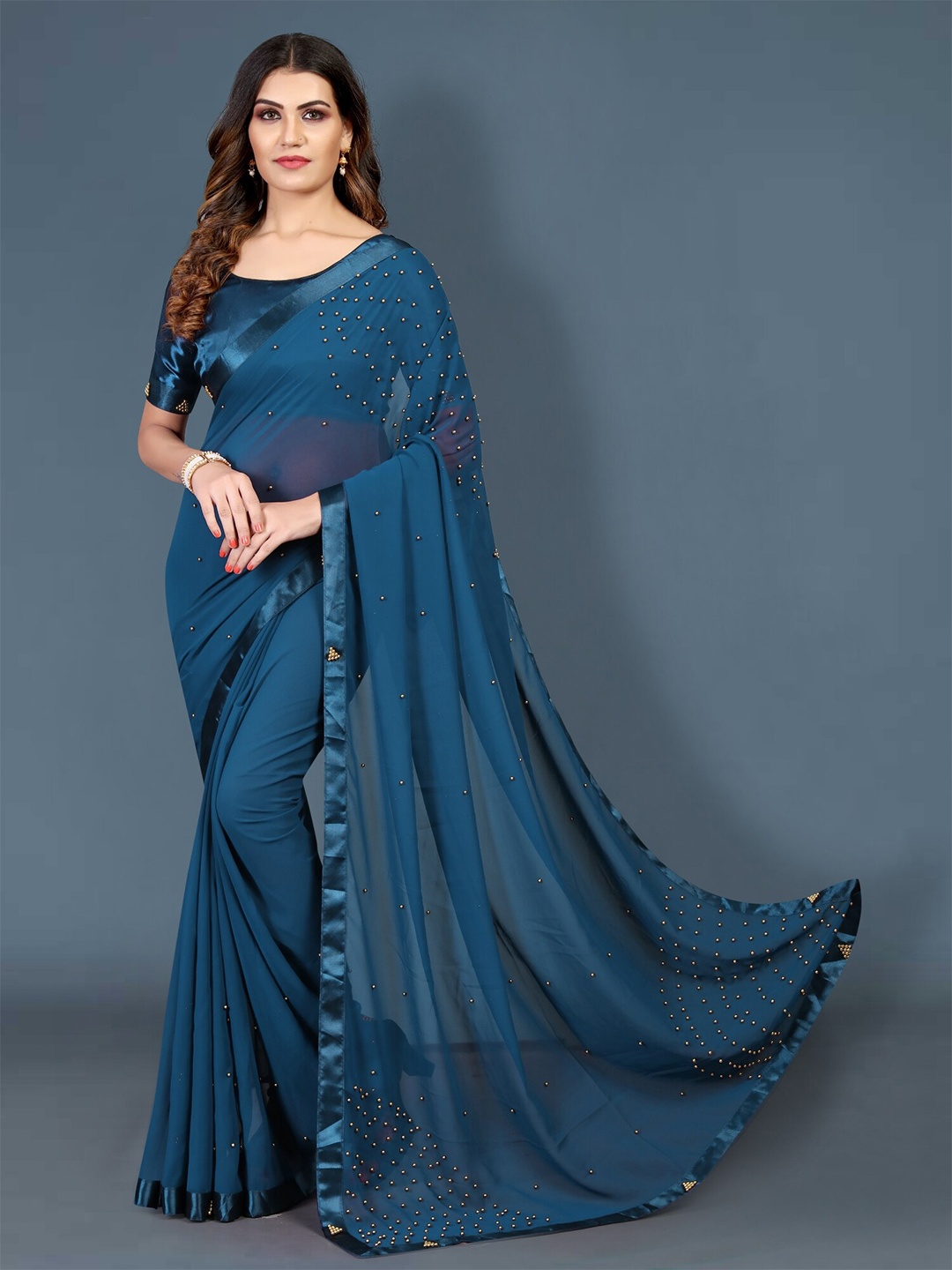 

APNISHA Blue & Silver-Toned Mirror Work Pure Georgette Saree
