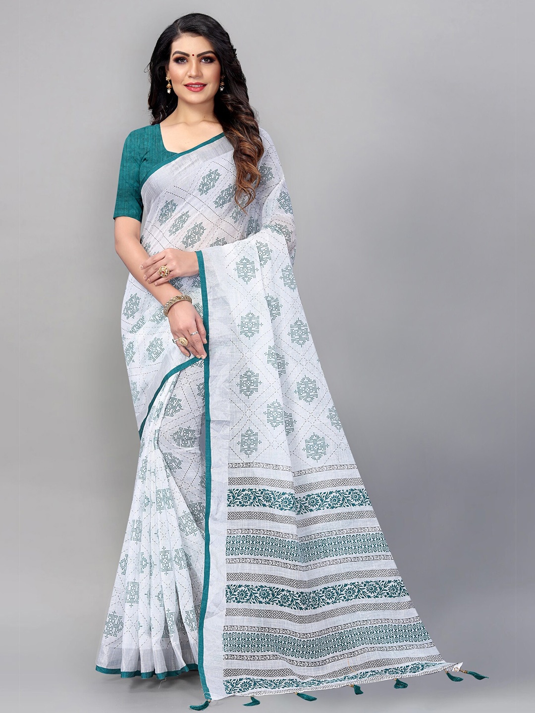 

APNISHA Teal & White Floral Zari Pure Cotton Saree