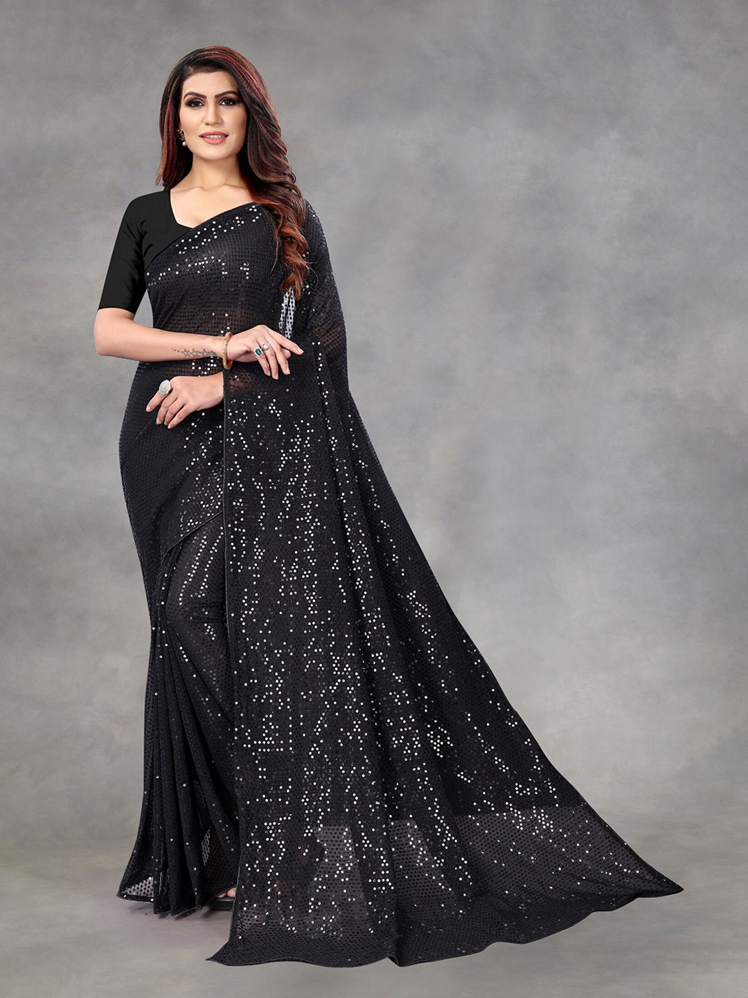 

APNISHA Black Embellished Pure Georgette Saree