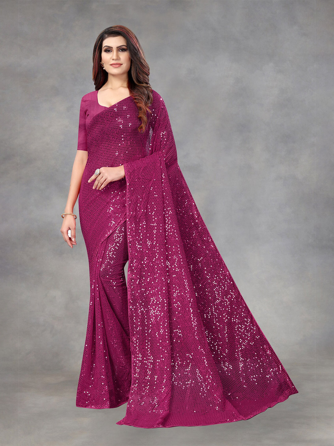 

APNISHA Purple Embellished Pure Georgette Saree