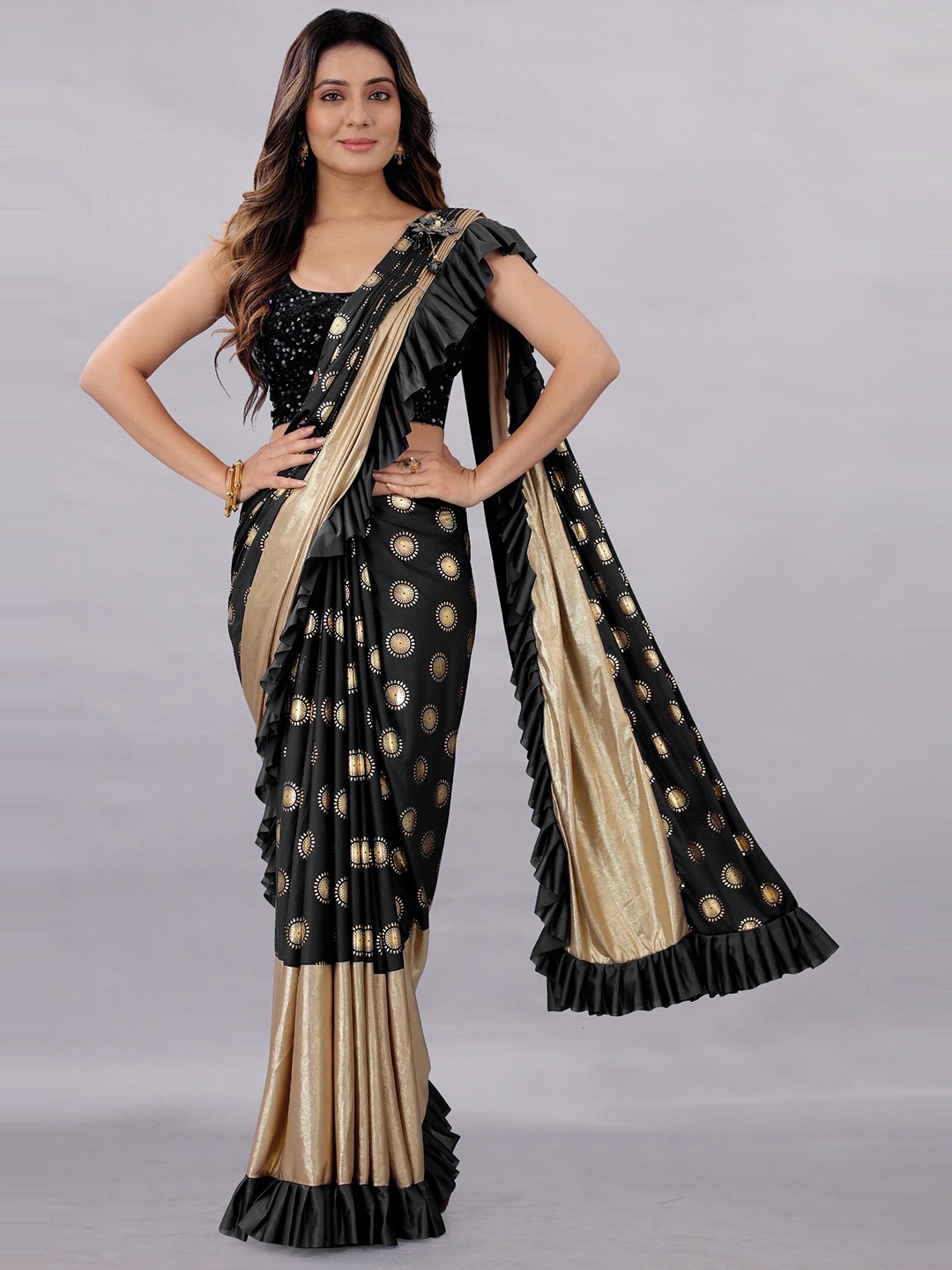 

APNISHA Black & Beige Embellished Zari Saree