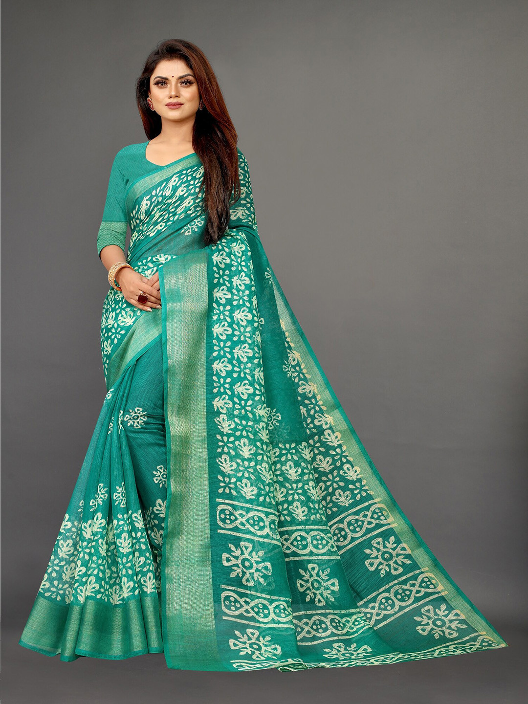 

APNISHA Teal & White Floral Zari Pure Cotton Saree