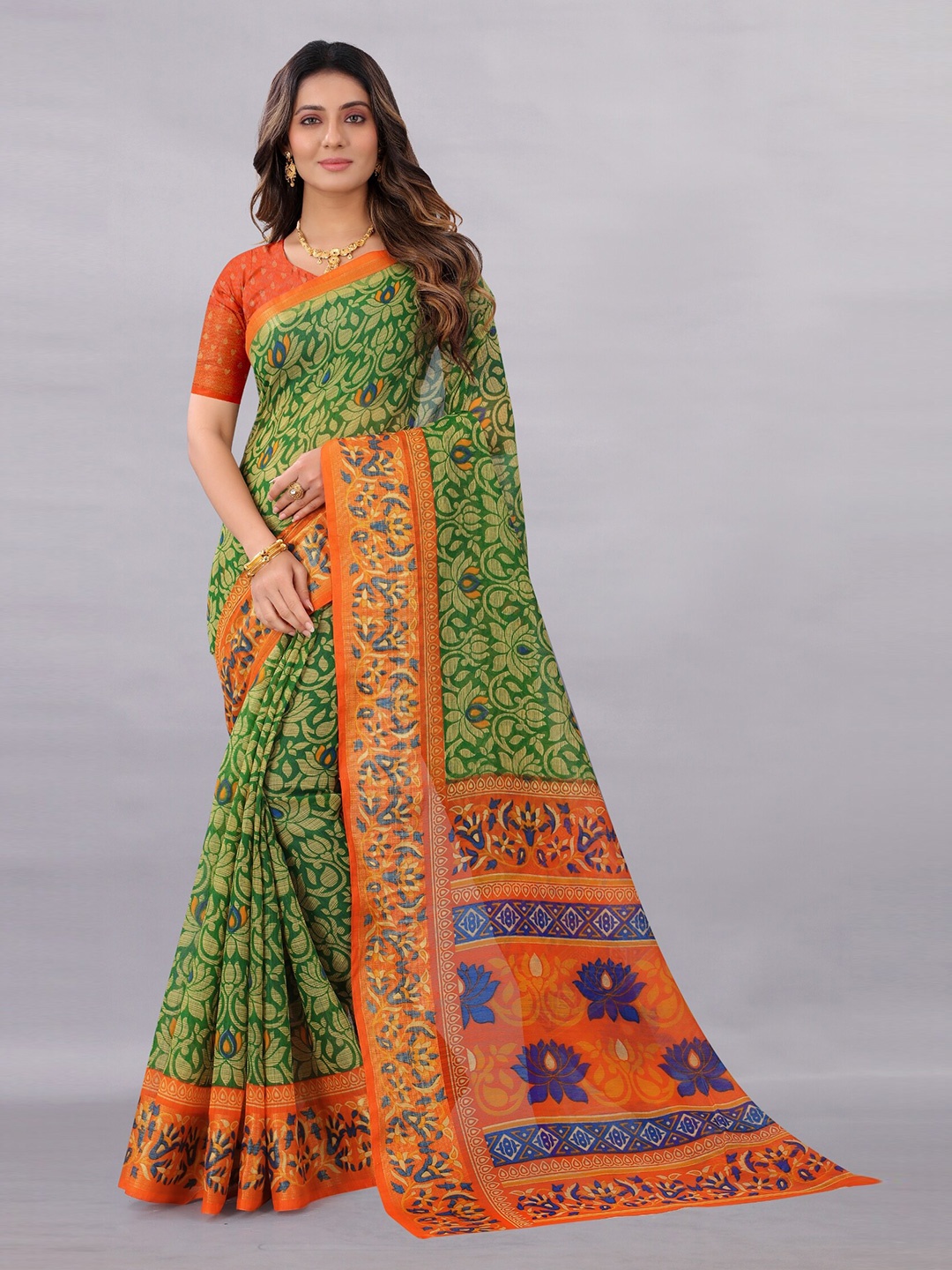 

APNISHA Green & Orange Floral Zari Pure Cotton Saree