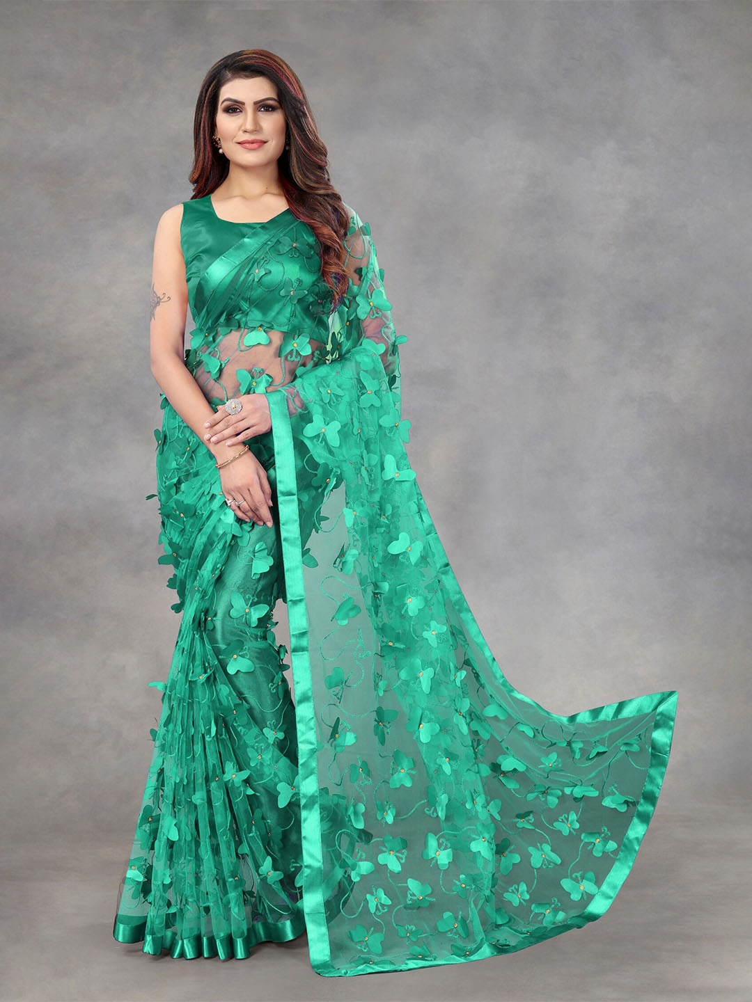 

APNISHA Teal Floral Embroidered Net Saree