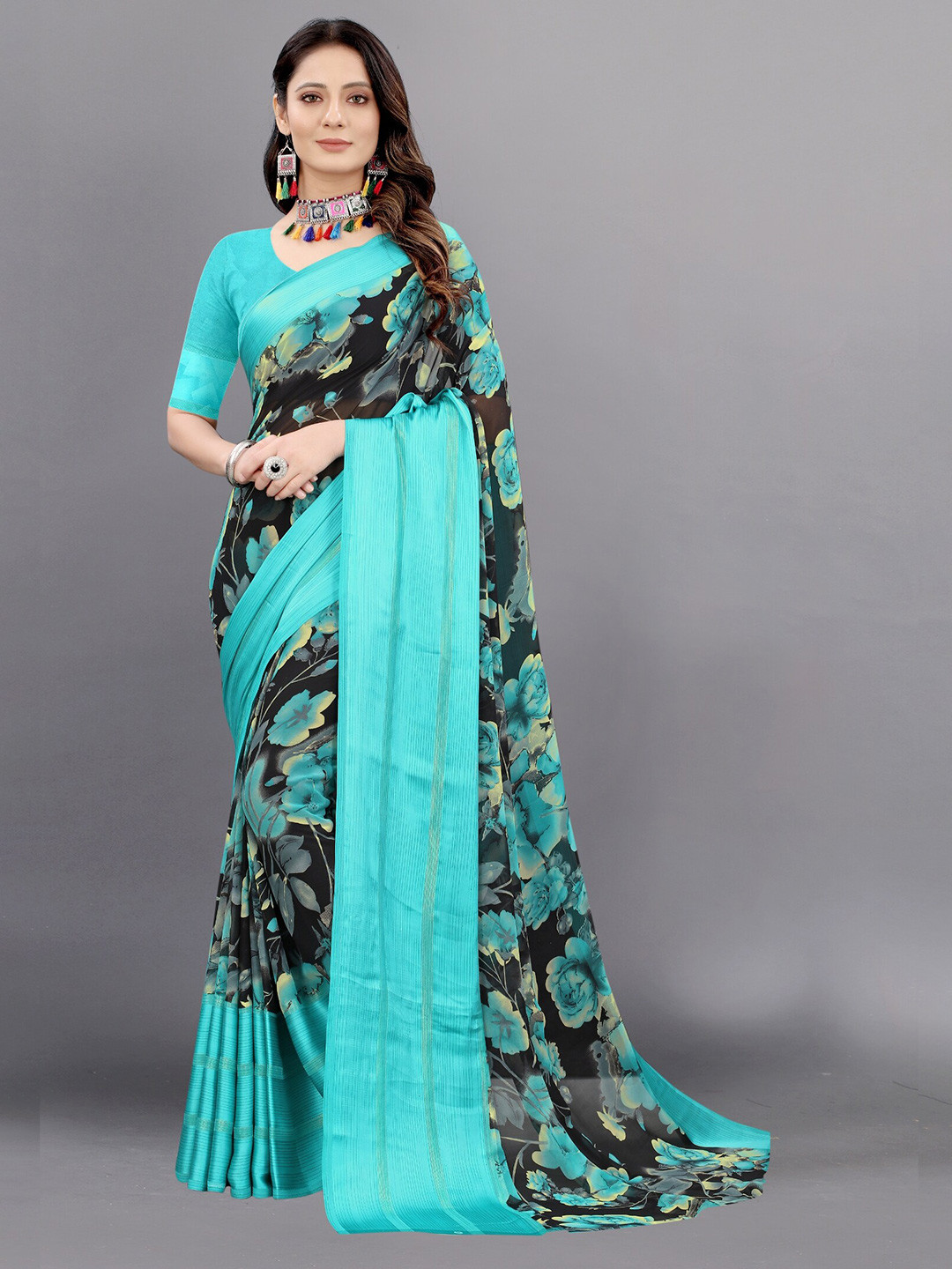 

APNISHA Blue & Black Floral Pure Georgette Saree