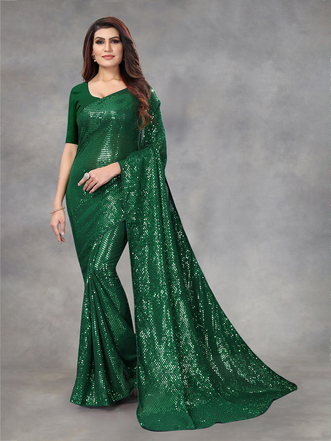 

APNISHA Green & White Embellished Pure Georgette Saree