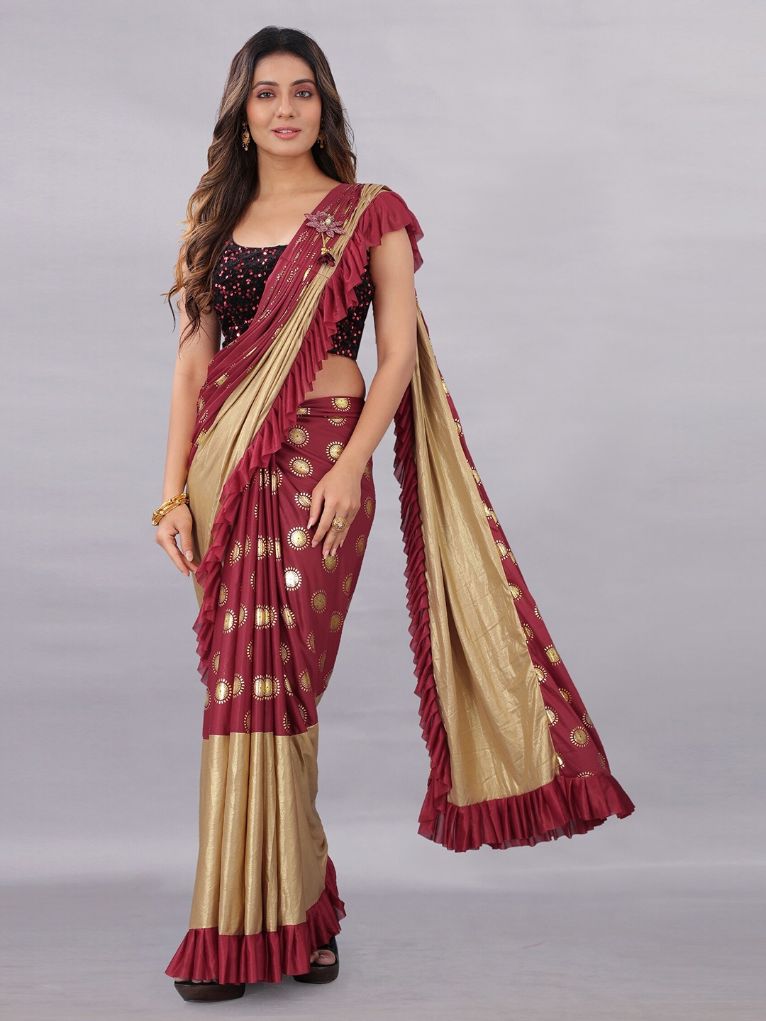 

APNISHA Maroon & Gold-Toned Ethnic Motifs Sequinned Saree