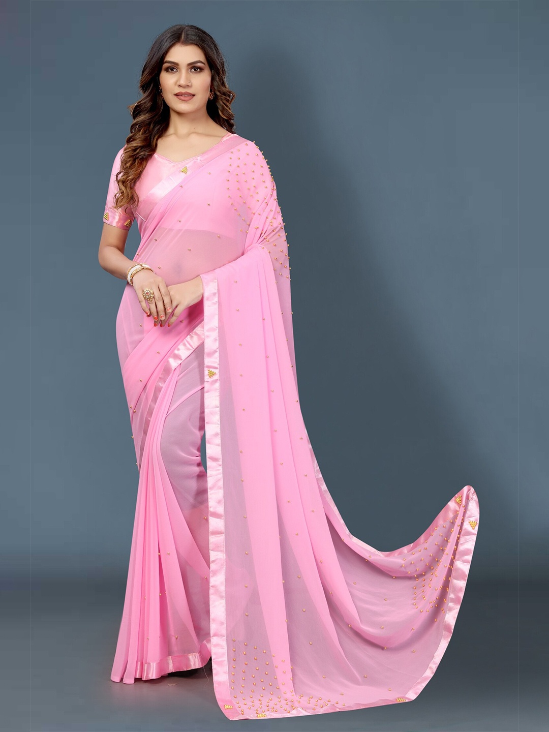 

APNISHA Pink Embellished Beads and Stones Pure Georgette Saree