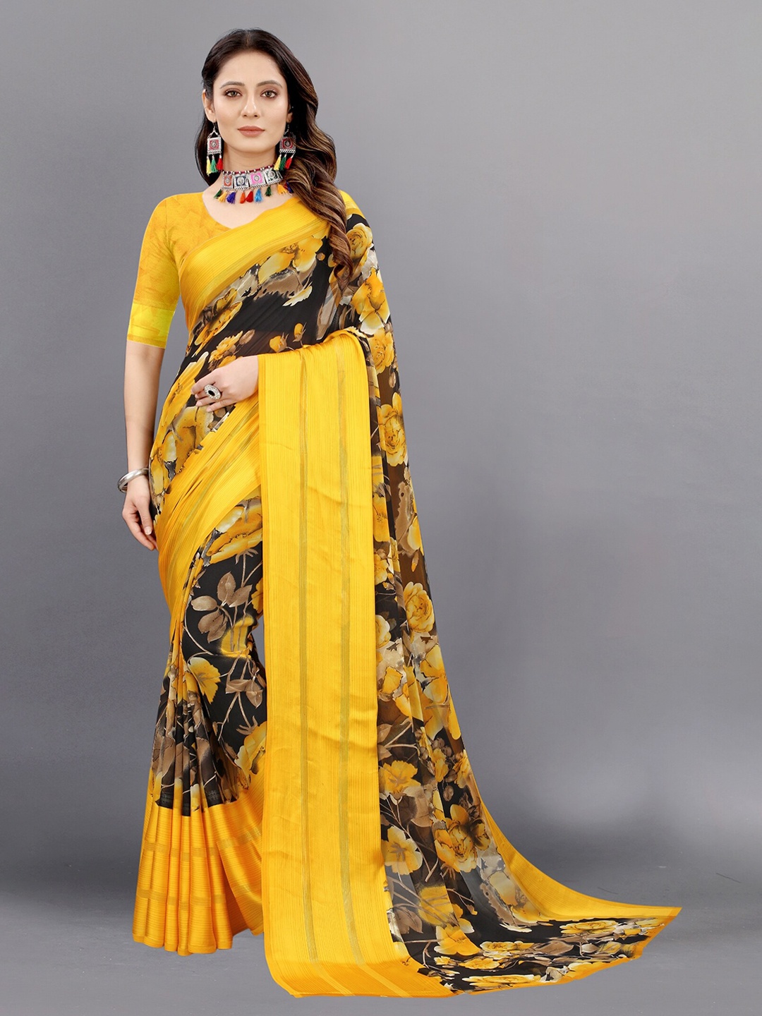 

APNISHA Yellow & Blue Floral Pure Georgette Saree
