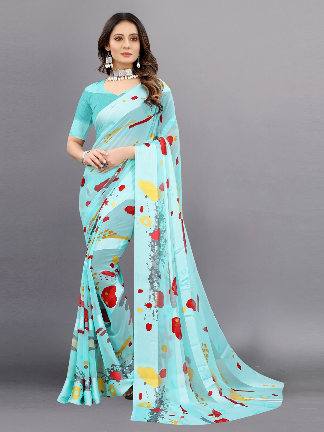 

APNISHA Blue & Red Pure Georgette Saree