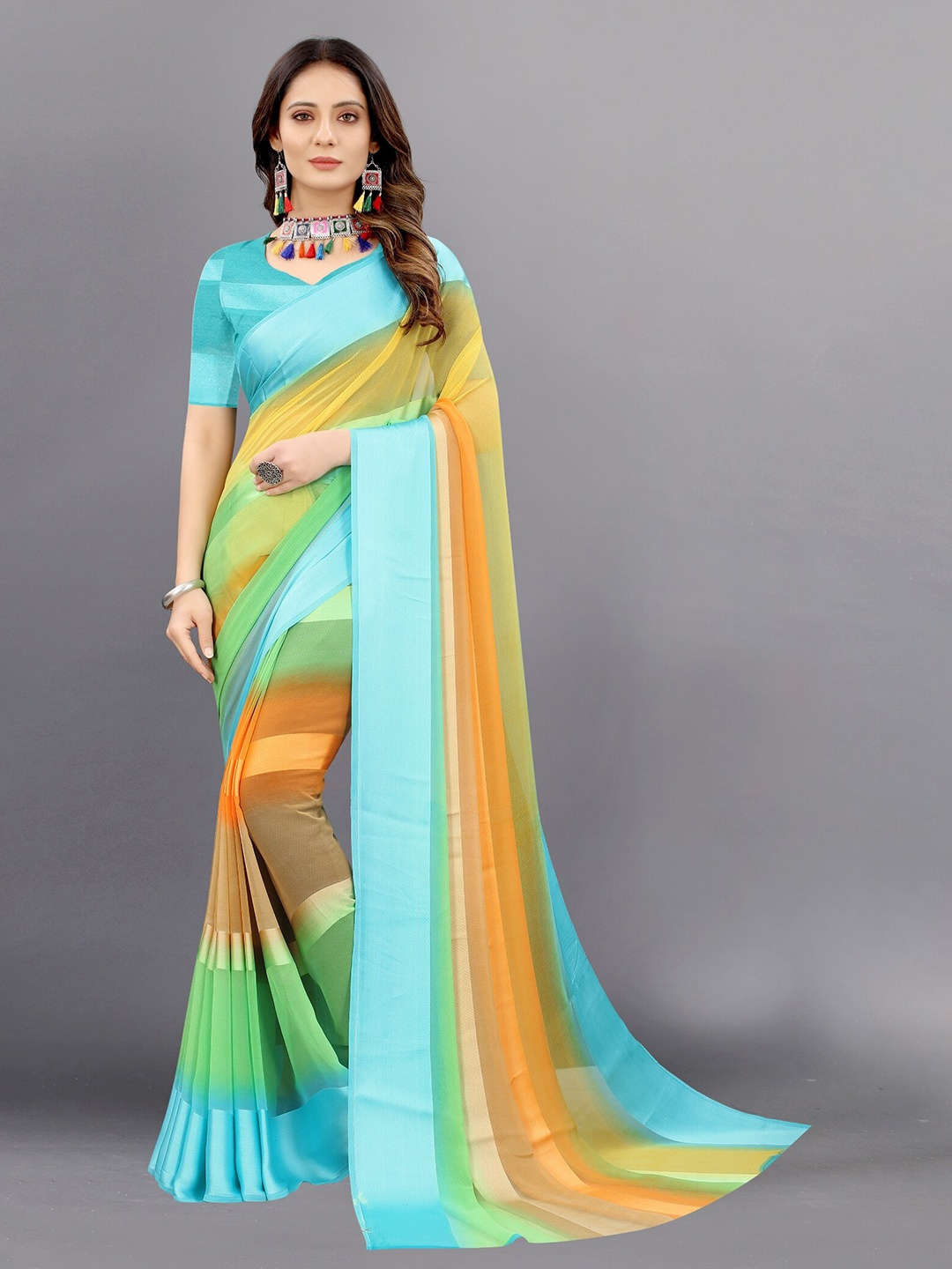 

APNISHA Blue & Green Striped Pure Georgette Saree