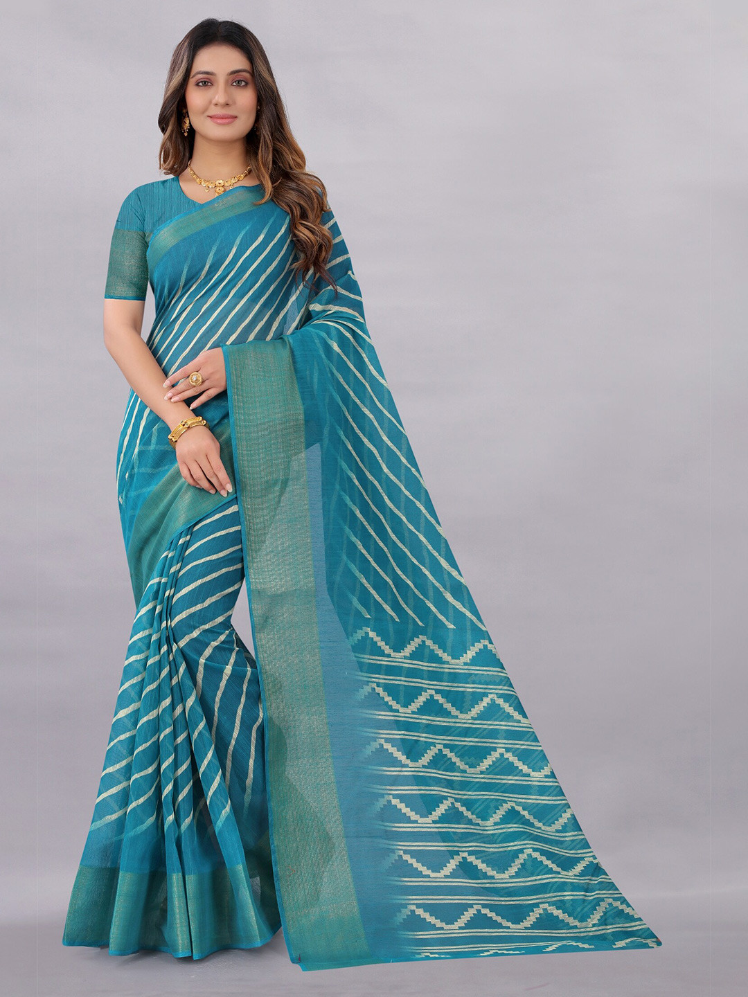 

APNISHA Blue & White Striped Zari Pure Cotton Saree