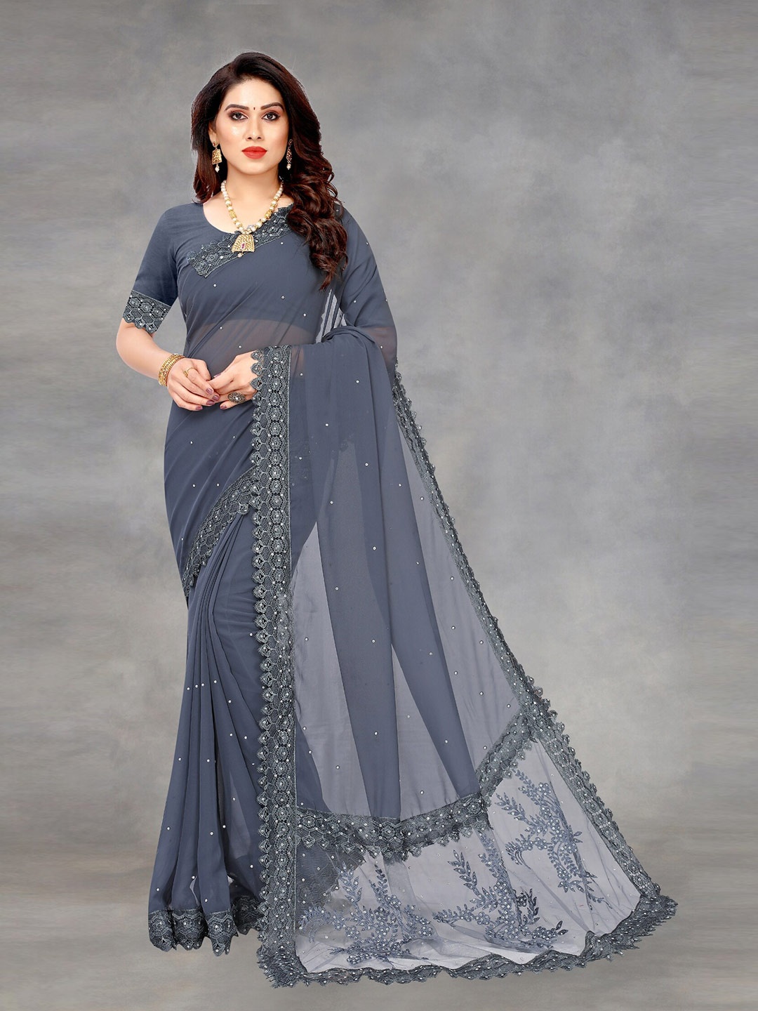 

APNISHA Grey & Silver-Toned Embellished Beads and Stones Pure Georgette Saree