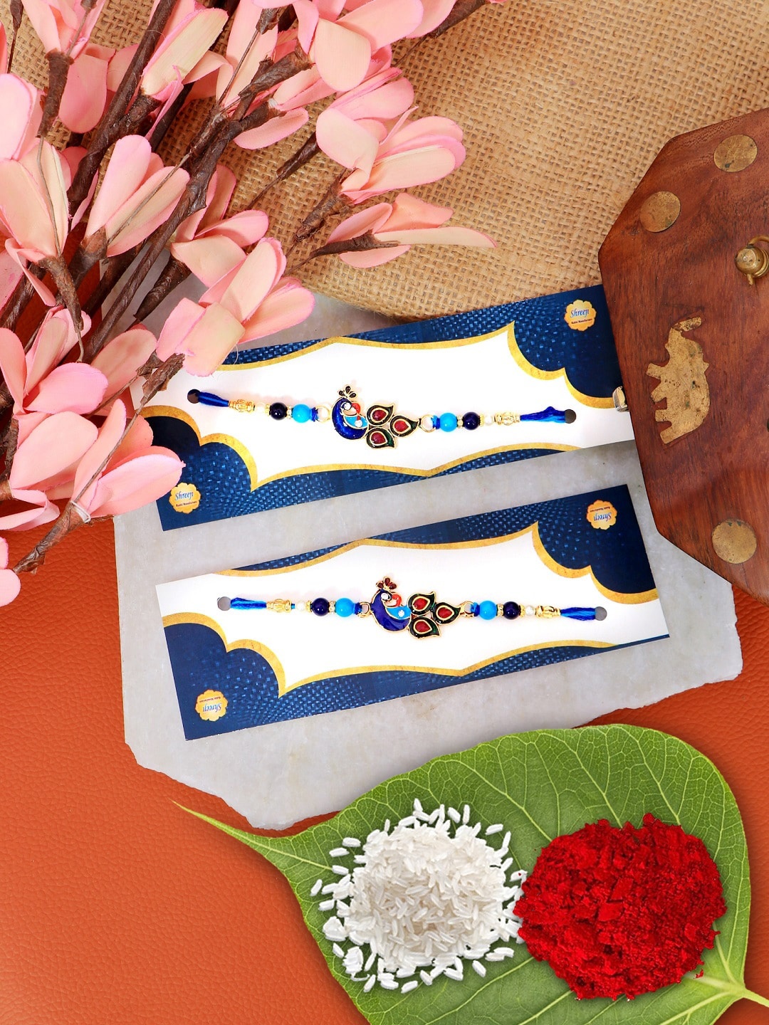 Crunchy Fashion Set Of 2 Blue & Red Peacock Studded Rakhis