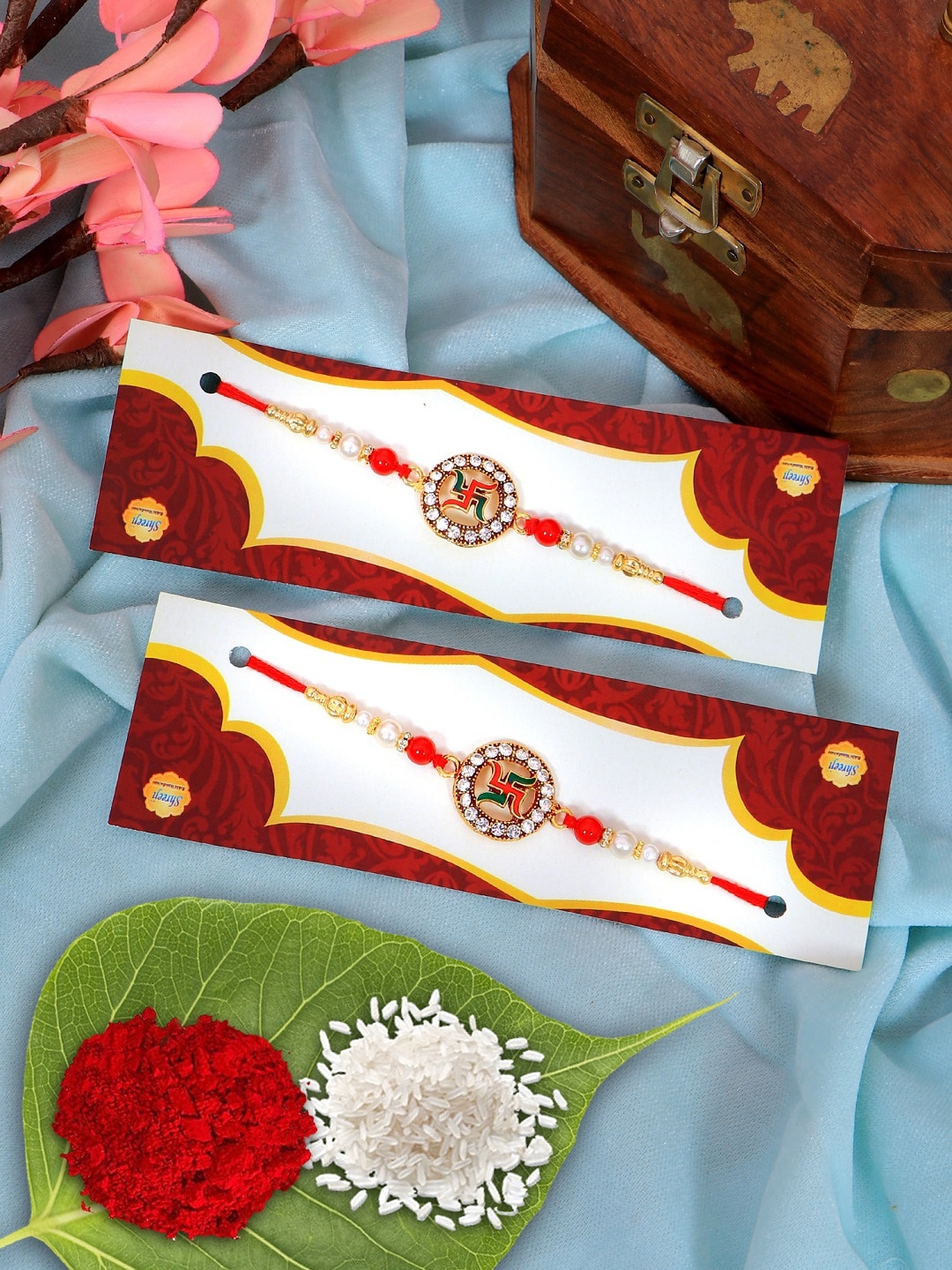 

Crunchy Fashion 2 Piece Multicolored Ethnic Swastik Thread Rakhi Set, Multi