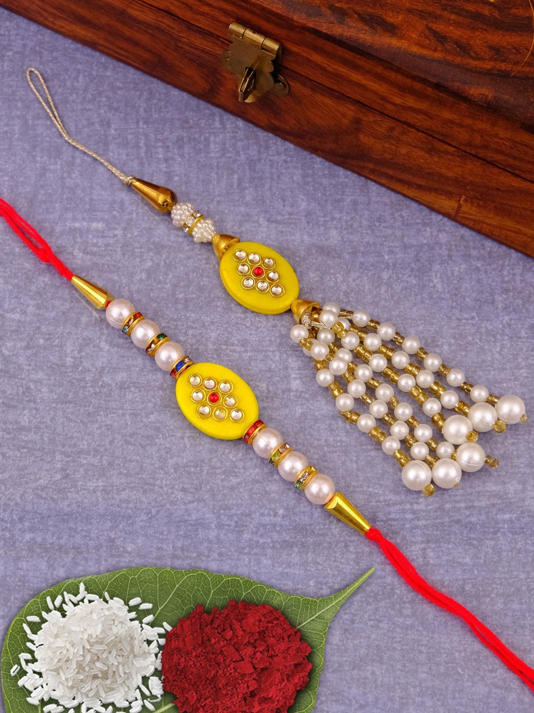 

Crunchy Fashion Set of 2 Kundan And Pearls Rakhi, Pink