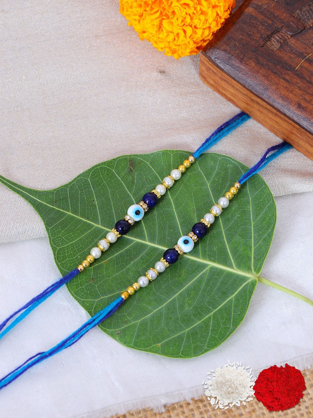 

Crunchy Fashion Pack of 2 Rakhis With Roli Chawal, Multi