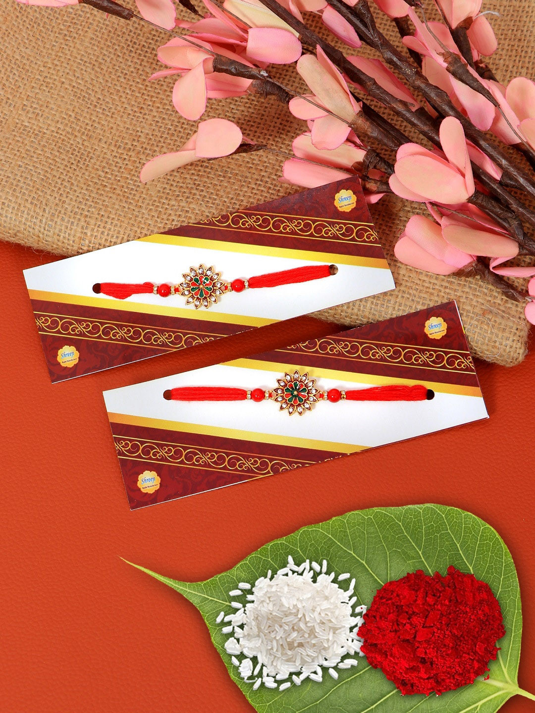 

Crunchy Fashion Red & Green Kundan Studded Rakhi With Roli & Chawal