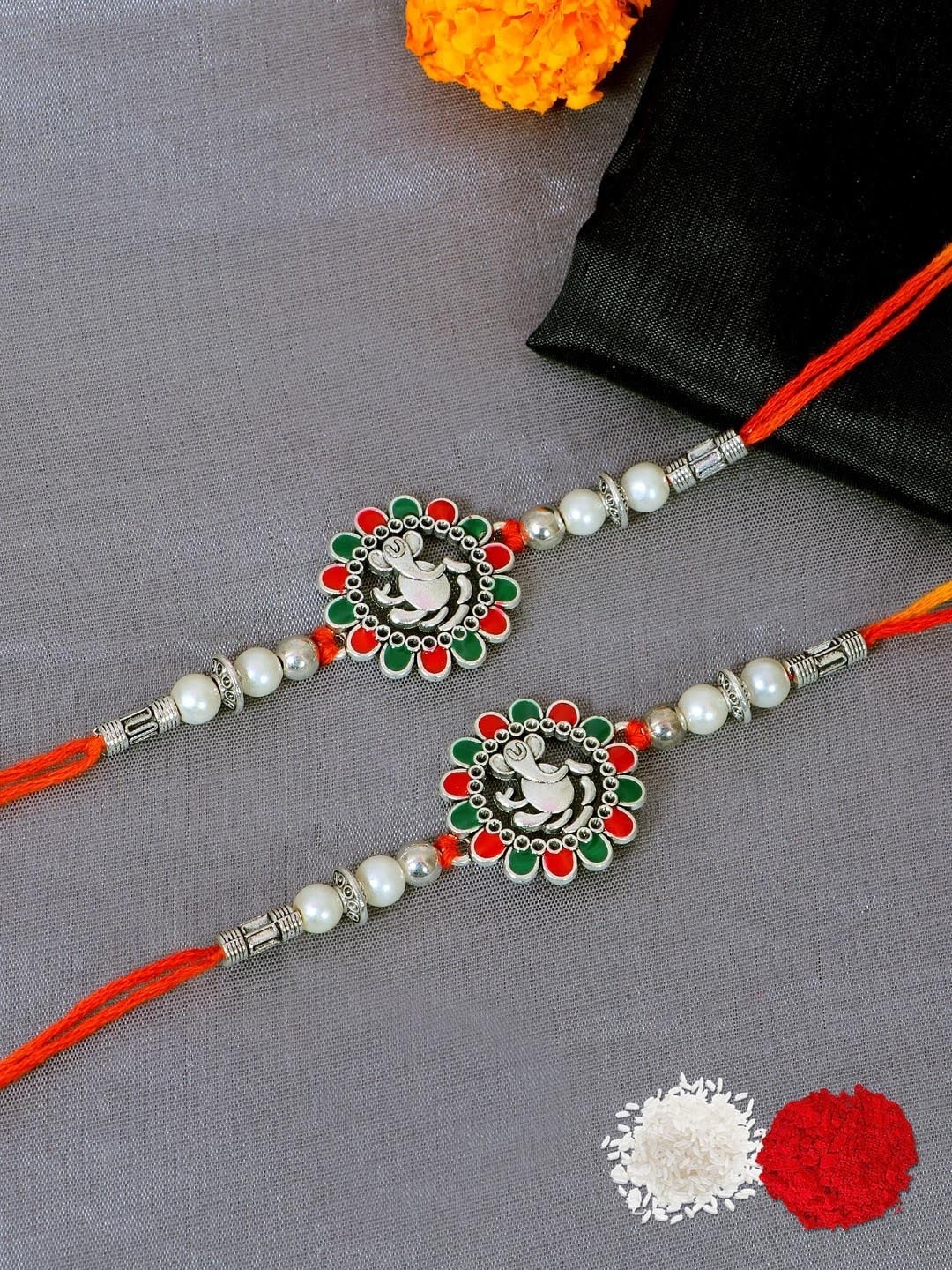 Crunchy Fashion Set Of 2 Yellow & Red Floral Studded Rakhis