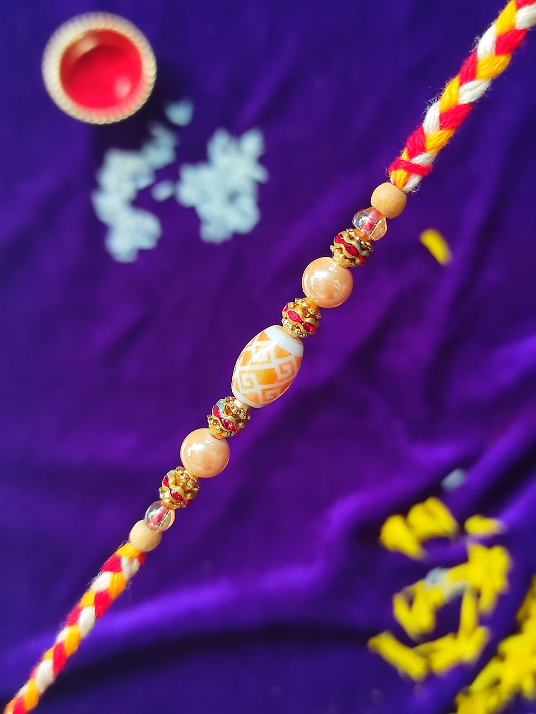 

CRAYTON Men Red & Yellow Beaded Rakhi