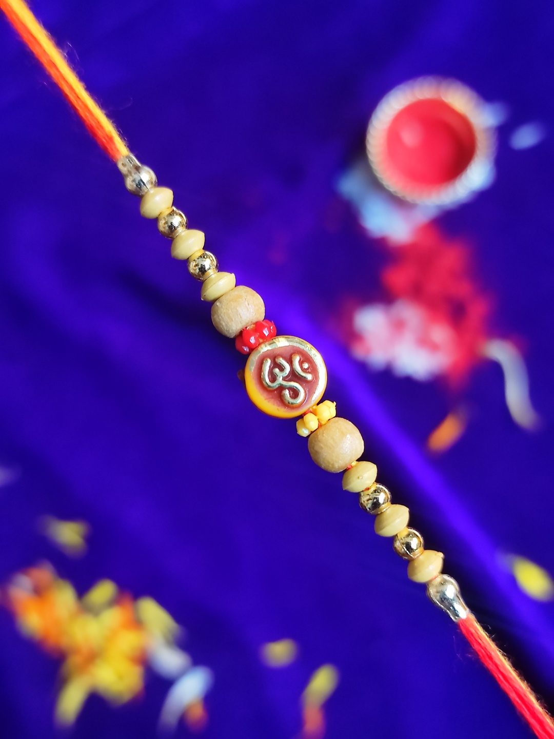 

CRAYTON Men Sandalwood Beaded Om Designed Threaded Rakhi, Red
