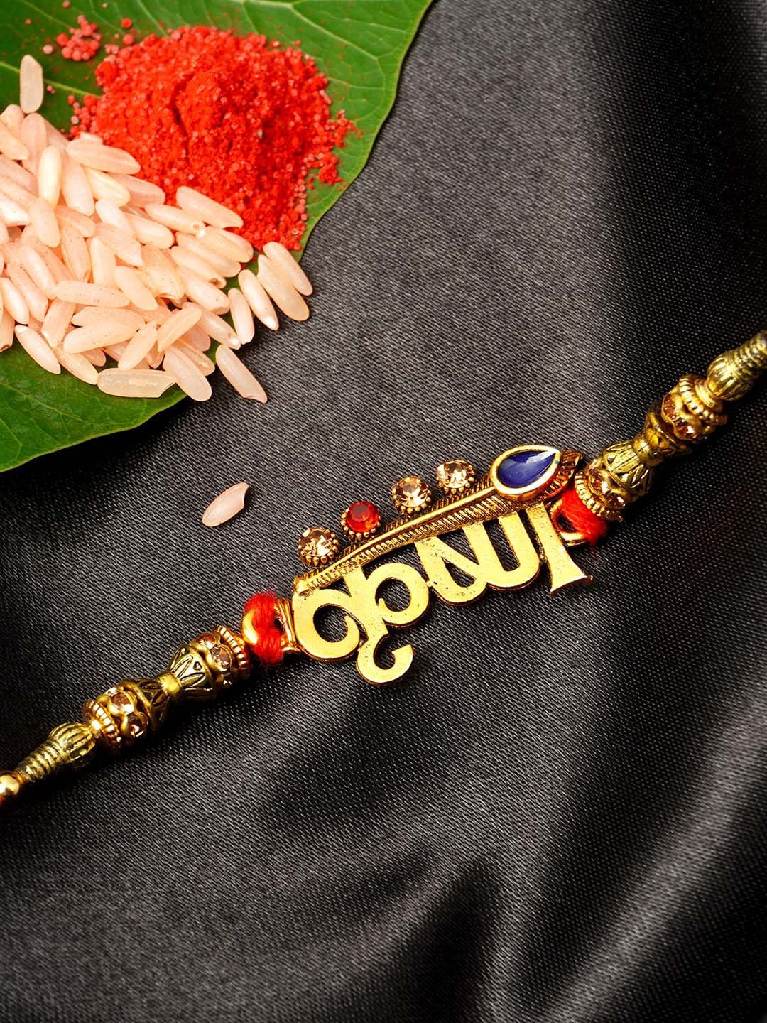 

Urmika Men Gold-Toned Designed Rakhi