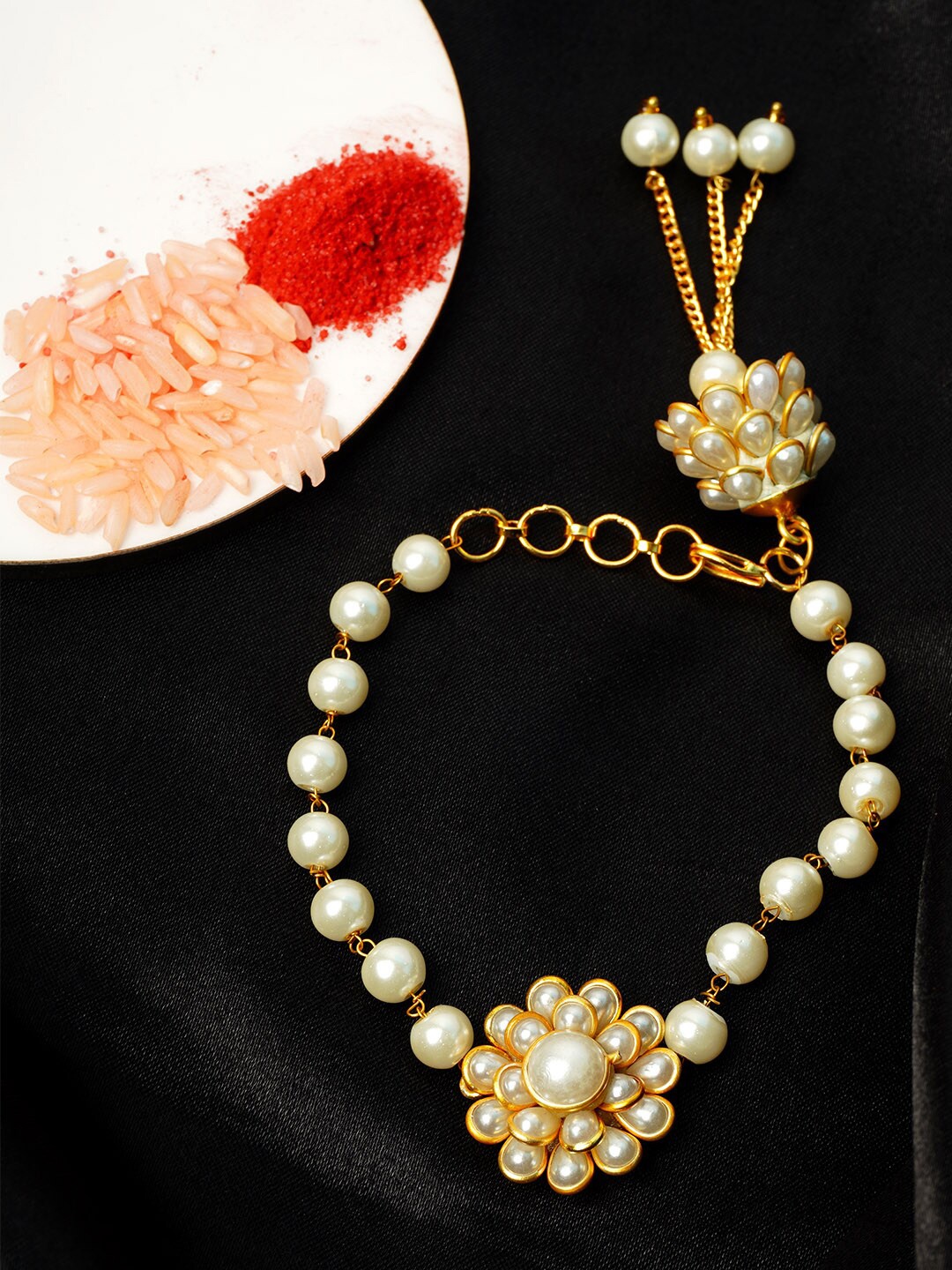 

Urmika Men Gold-Toned & White Pearl Beaded Rakhi