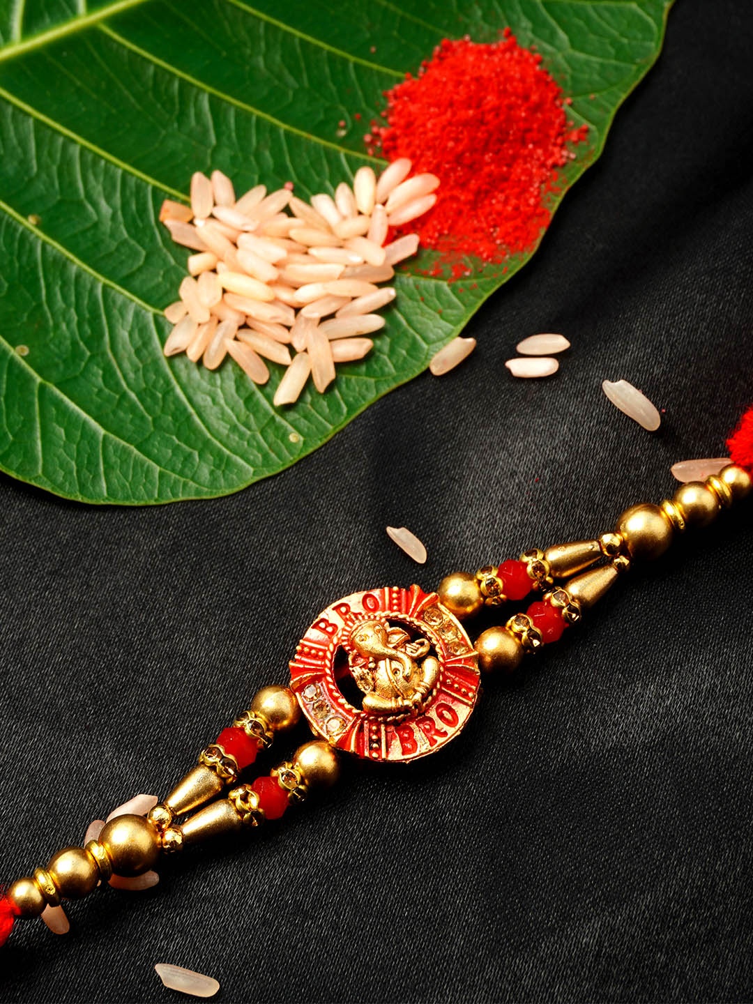 

Urmika Men Gold-Toned & Red Rakhi & Roli Chawal