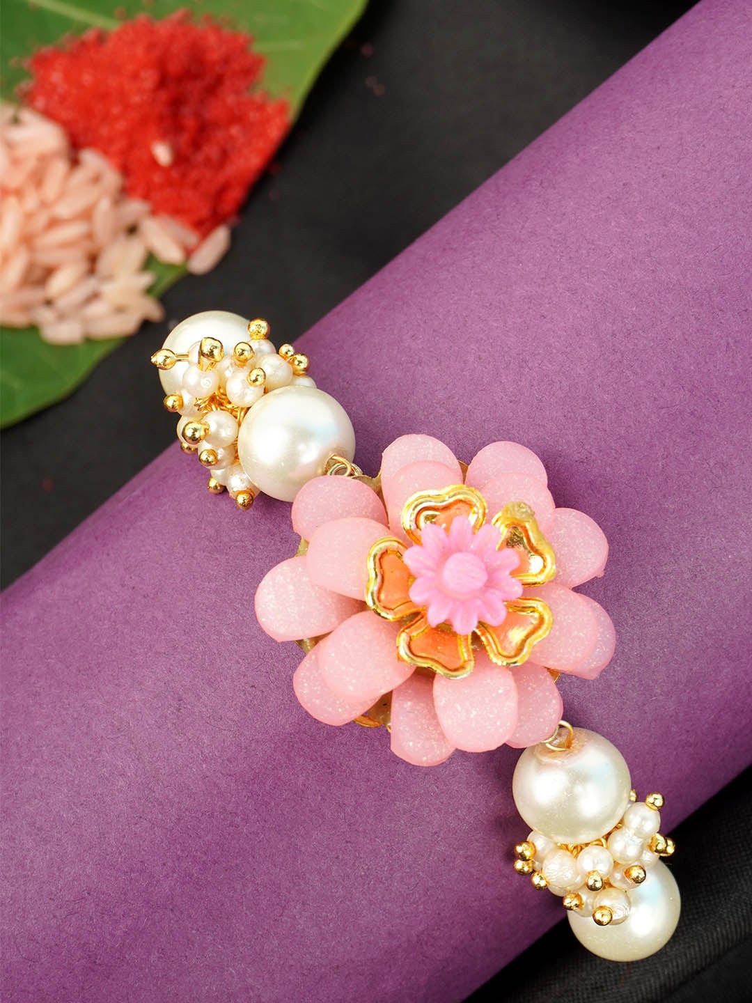 

Urmika Men Pink & White Beaded & Floral-Charm Rakhi With Roli Chawal
