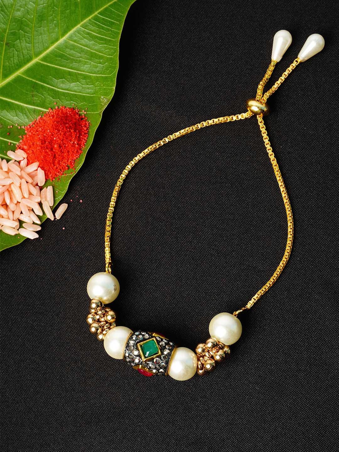 

Urmika Men Gold-Toned Green & White Stone Studded Ethnic Rakhi With Roli Chawal