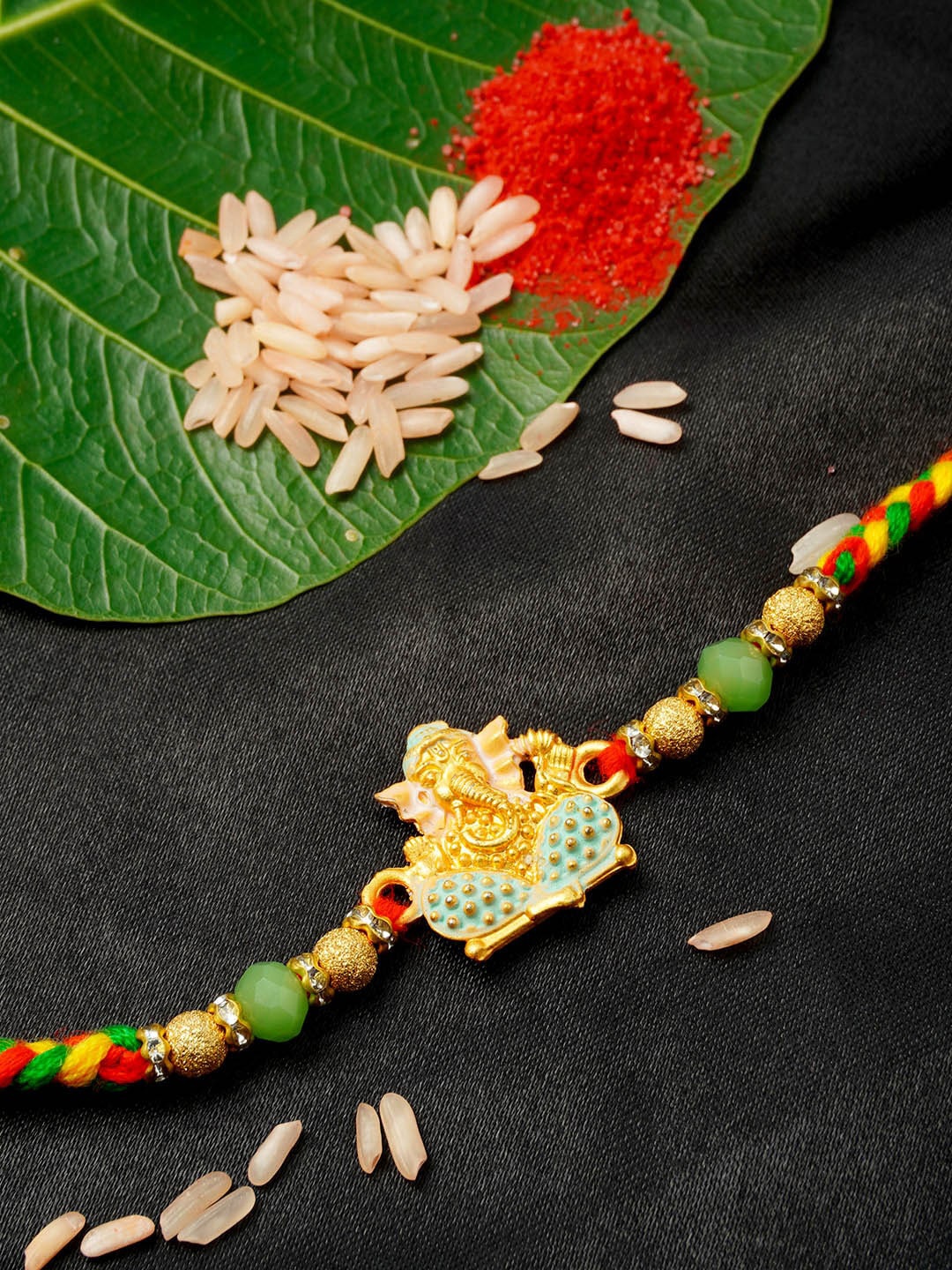 

Urmika Men Multicoloured Ganeshji Rakhi, Multi